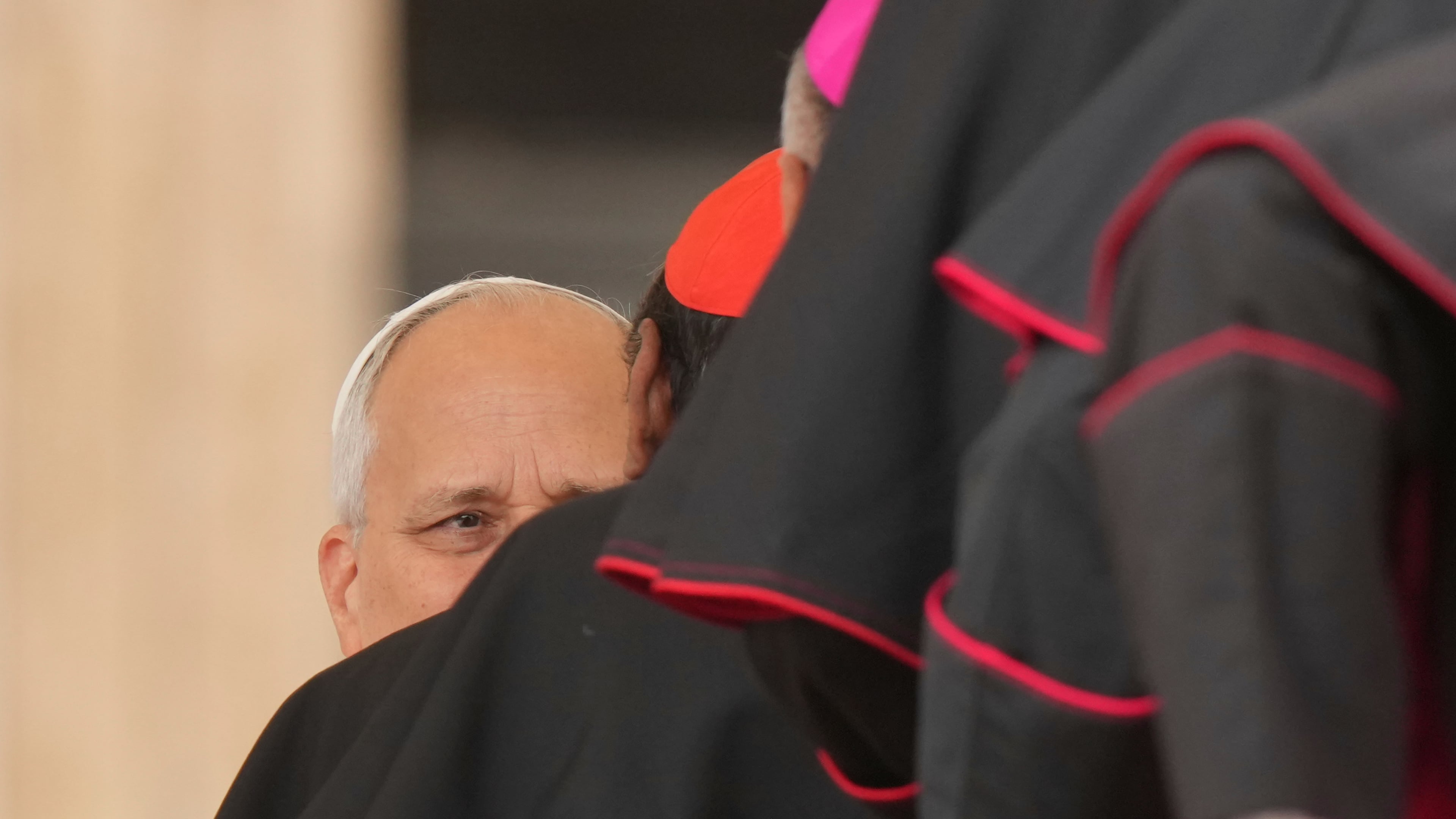 Pope Leo XIV is greeted by cardinals and bishops at the end of his weekly general audience in St. Peter's Square, at the Vatican, Wednesday, Oct. 7, 2026. (AP Photo/Andrew Medichini)