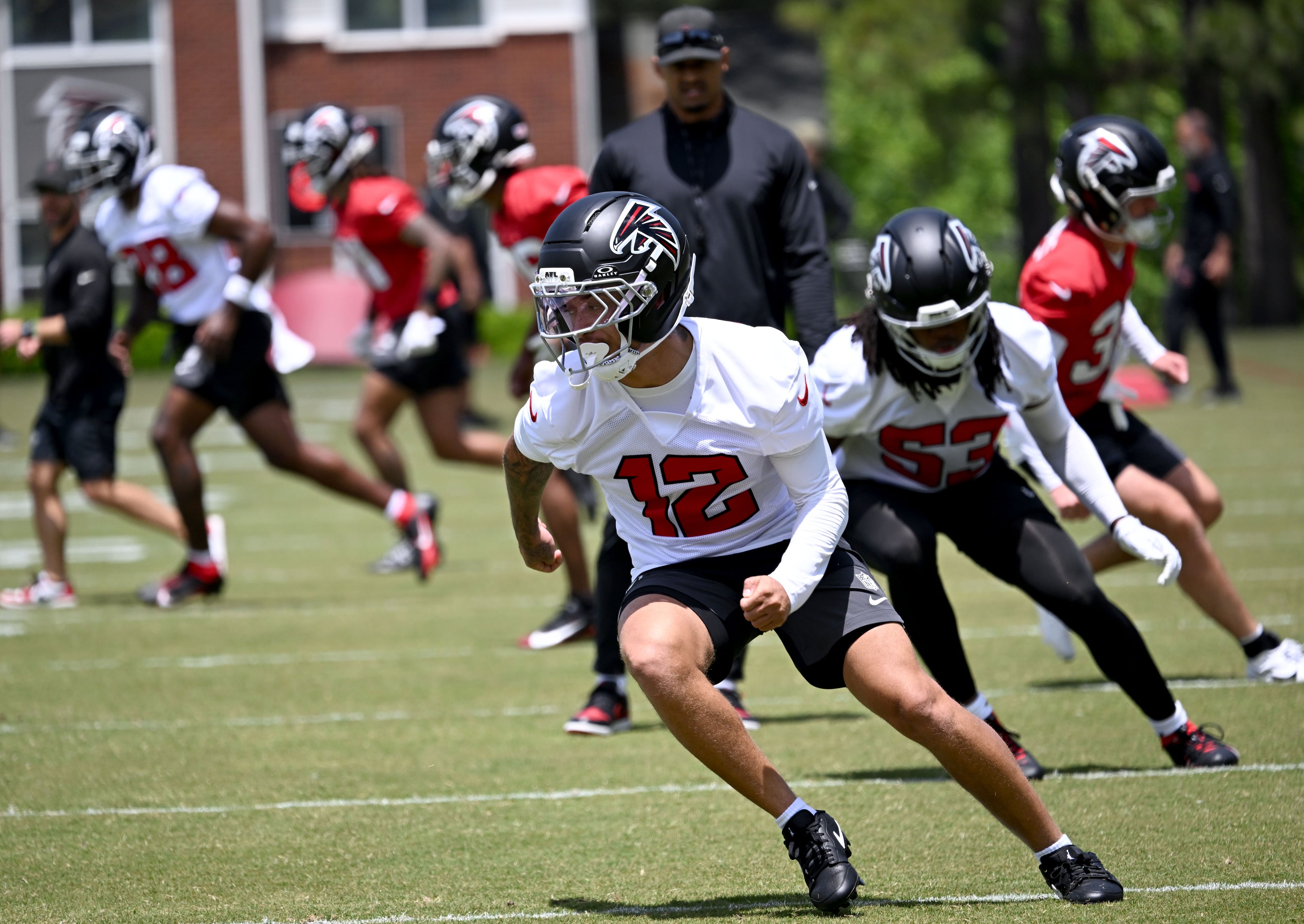 Atlanta Falcons rookie cornerback Avieon Terrell (12) warms up during the Falcons’ rookie minicamp at the team’s training facility on Friday, May 8, 2026, in Flowery Branch. (Hyosub Shin/AJC)