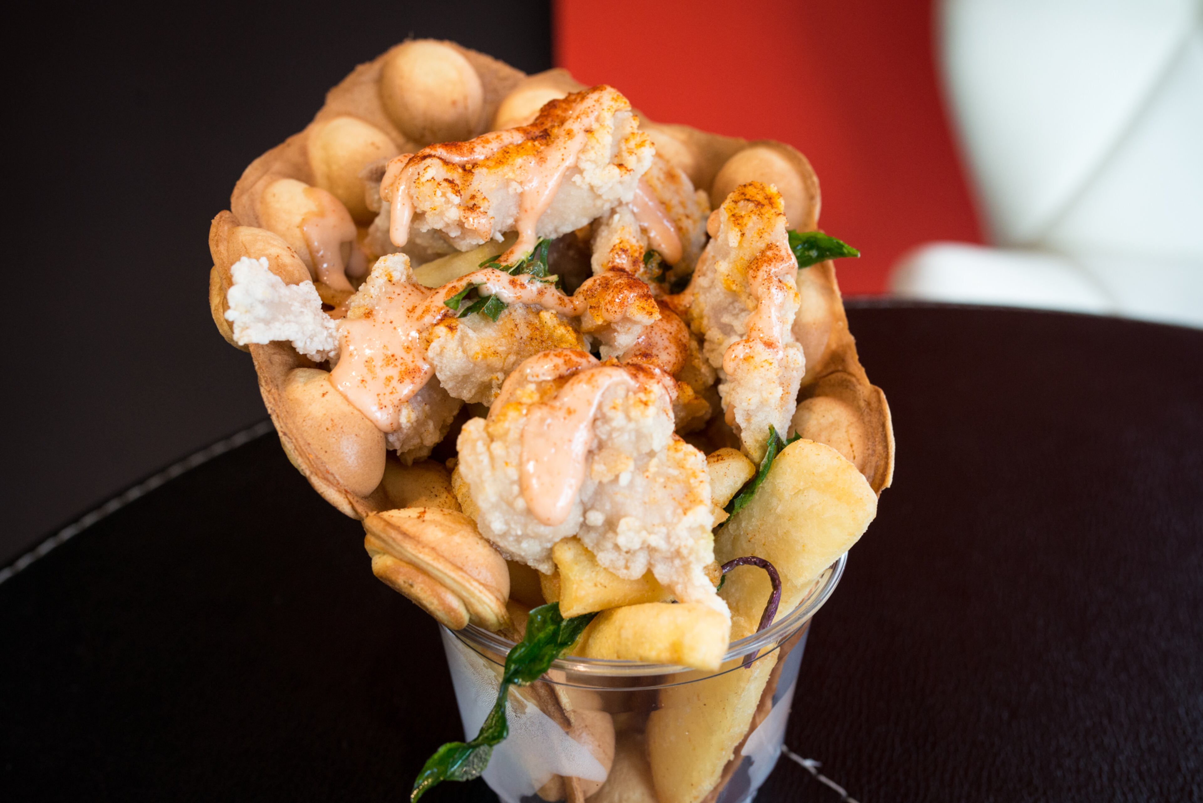 Boba Bee Savory Chicken and Waffle cone with Taiwan popcorn chicken and fries. Photo credit- Mia Yakel.