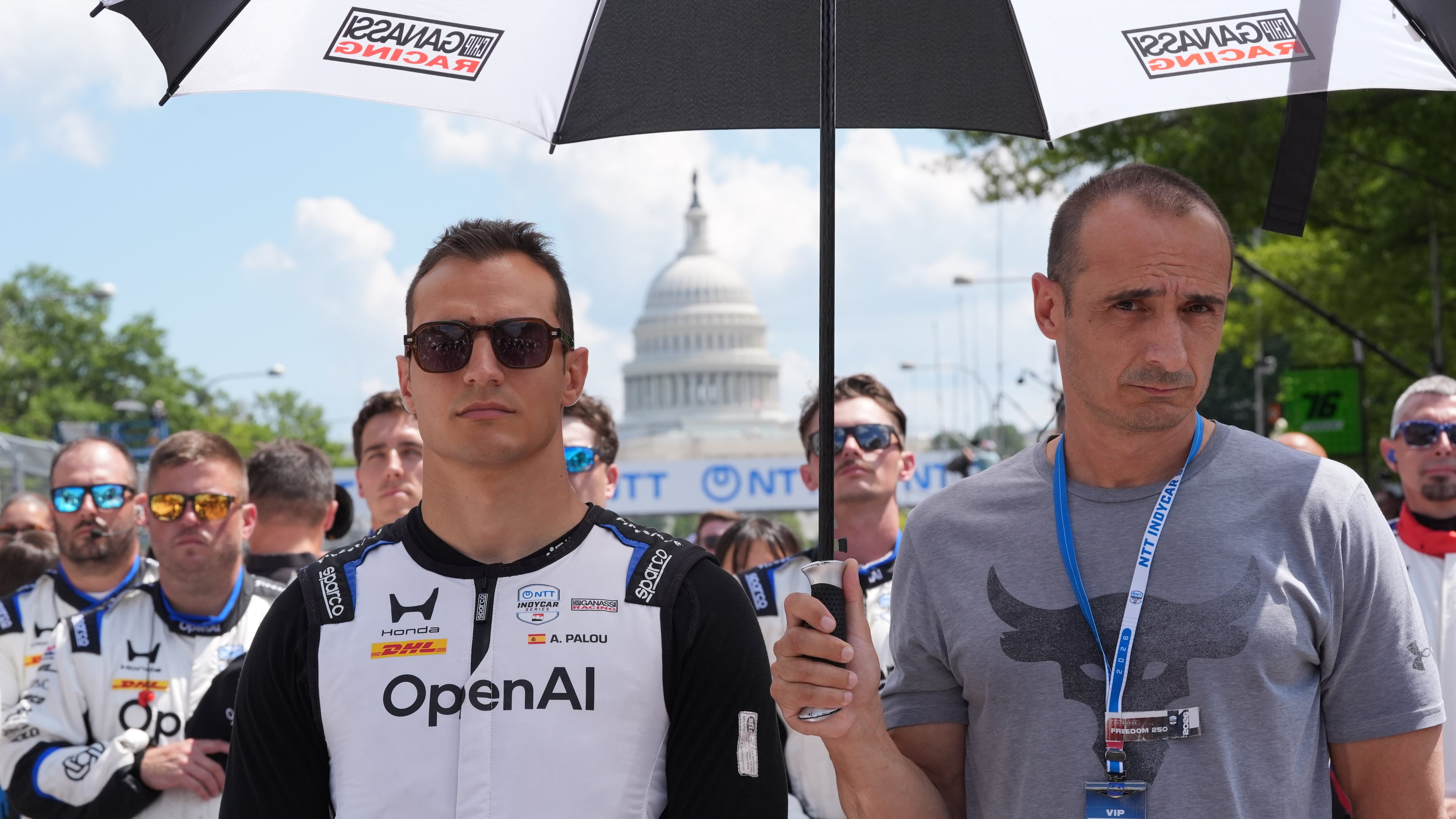 Alex Palou (10) of Spain stands during the National Anthem before the IndyCar Freedom 250 Grand Prix auto race in Washington, Sunday, Aug. 23, 2026. (AP Photo/Alex Brandon)