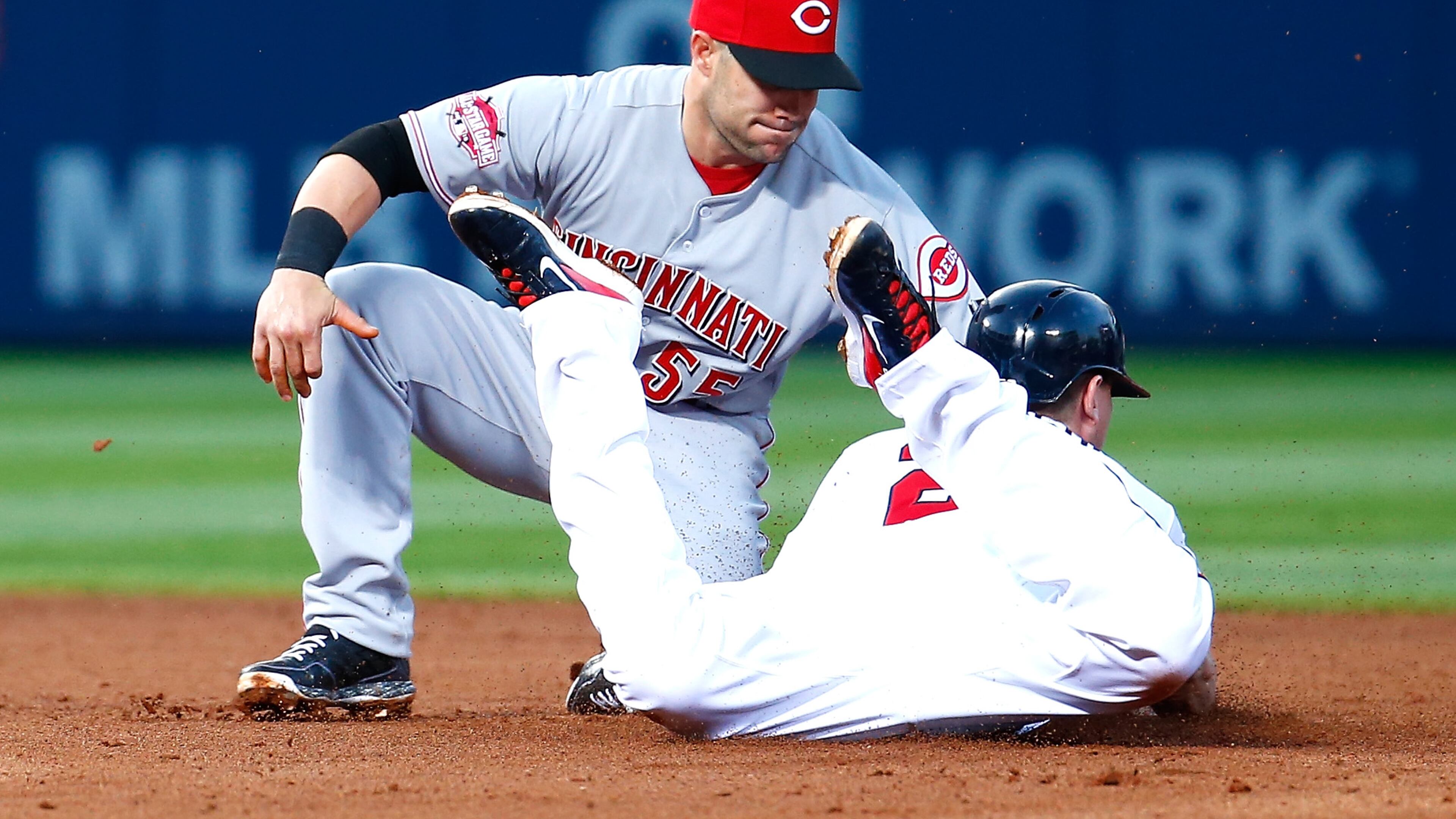 Chris Johnson #23 of the Atlanta Braves is caught stealing second base by Skip Schumaker #55 of the Cincinnati Reds in the fourth inning at Turner Field on April 30, 2015 in Atlanta, Georgia. (Photo by Kevin C. Cox/Getty Images)