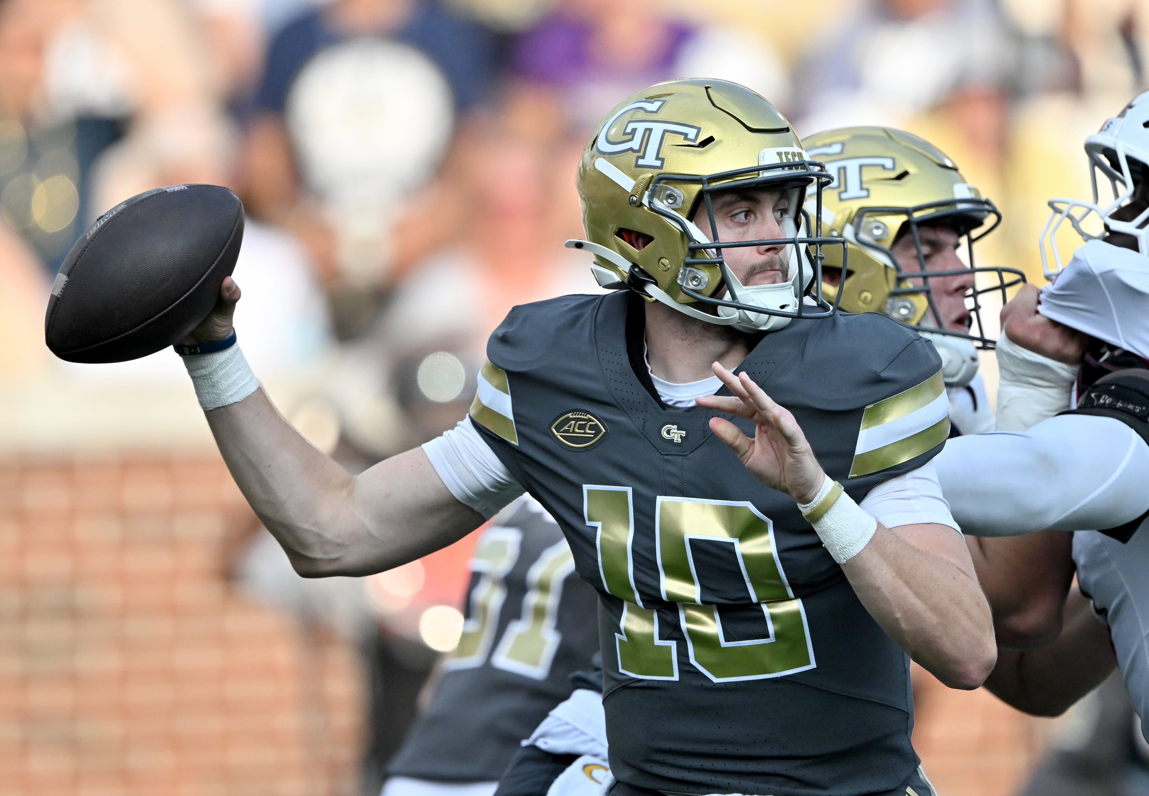 Georgia Tech quarterback Haynes King gets off a pass during the first half of an NCAA college football game at Georgia Tech's Bobby Dodd Stadium, Saturday, Sept. 20, 2025 in Atlanta. (Hyosub Shin/AJC)