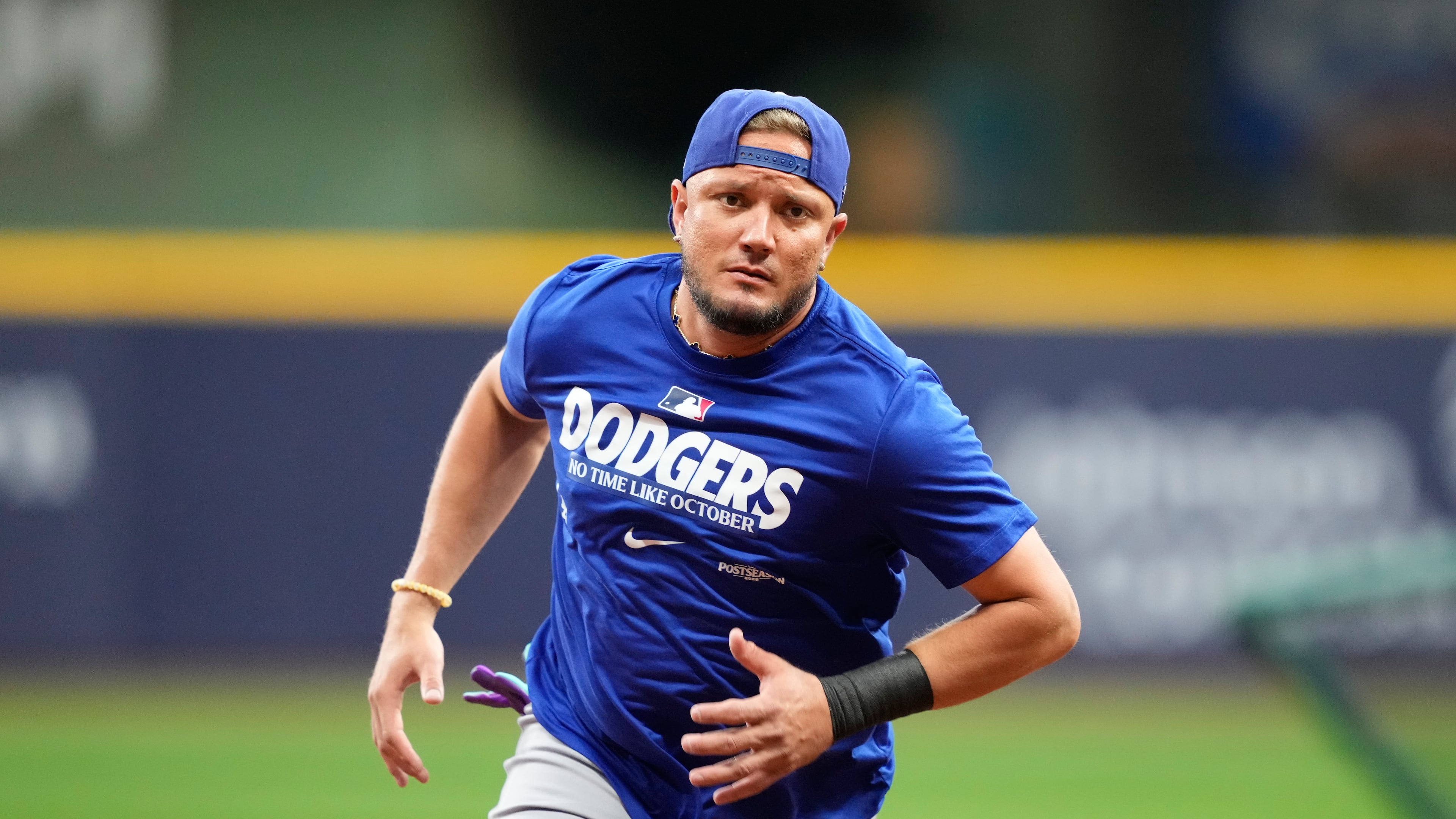 Los Angeles Dodgers' Miguel Rojas works out ahead of Game 1 of baseball's National League Championship Series between the Milwaukee Brewers and the Los Angeles Dodgers, Saturday, Oct. 10, 2026, in Milwaukee. (AP Photo/Kyla Wolf)