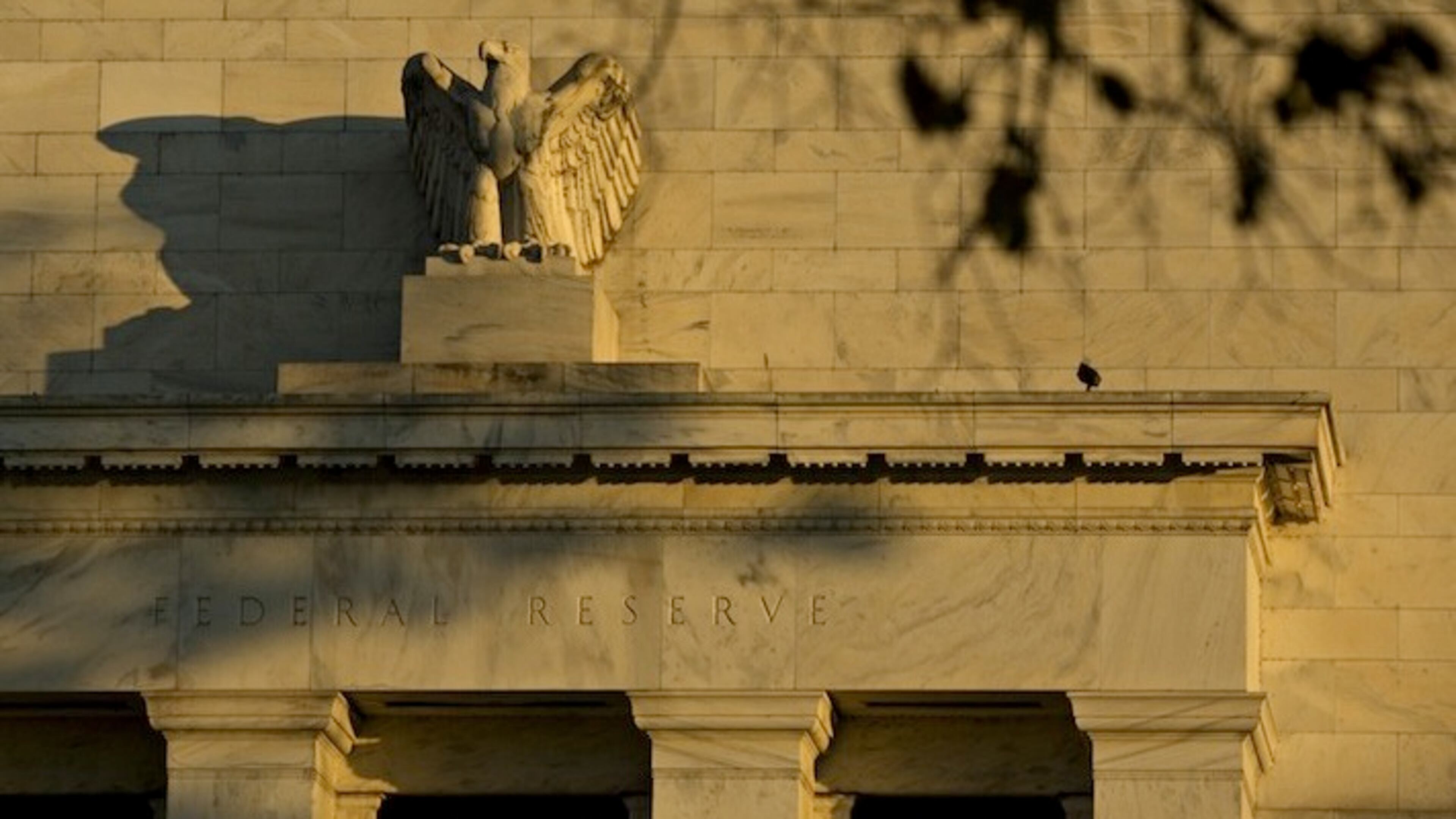 An eagle sculpture stands on the facade of the Marriner S. Eccles Federal Reserve building in Washington on Nov. 18, 2016. MUST CREDIT: Bloomberg photo by Andrew Harrer.
