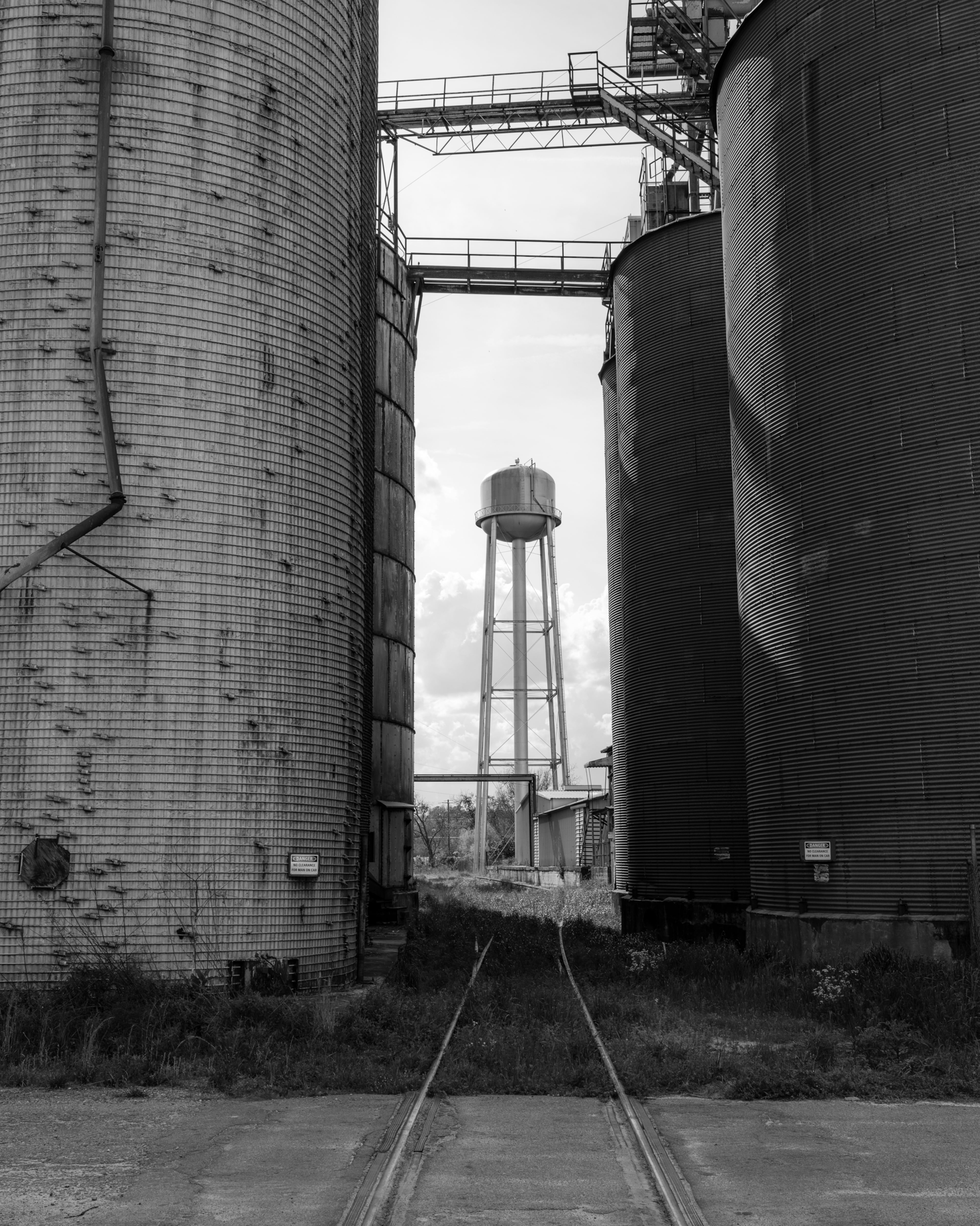 "Old Water Tower, Estill, South Carolina," a 2021 photograph by Parker Stewart. Photos of Georgia's coast by Stewart and Jack Leigh are on display at Laney Contemporary, a Savannah gallery, until Aug. 1, 2026. (Courtesy of Parker Stewart/Laney Contemporary)