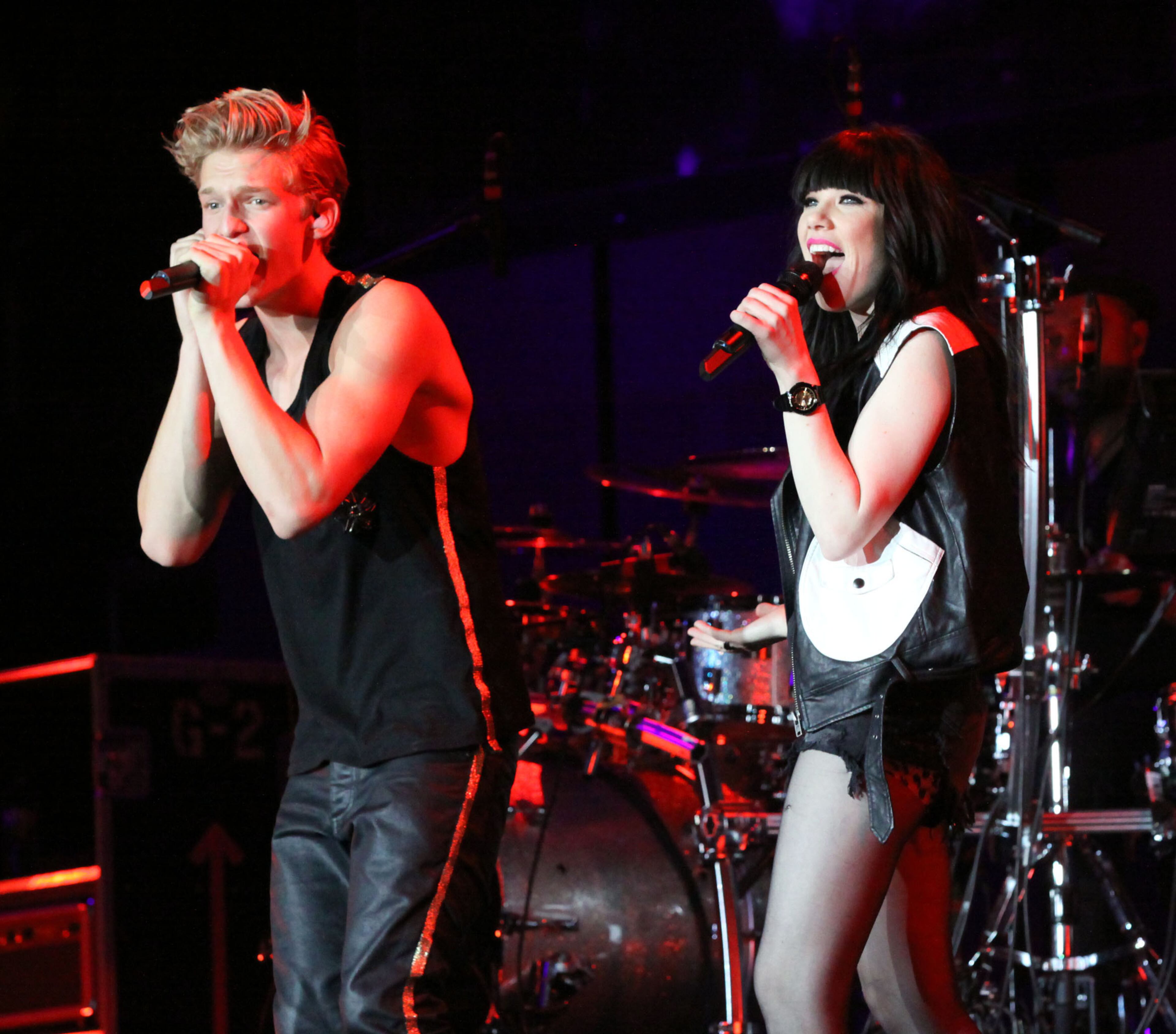 Pop singers Cody Simpson and Carly Rae Jepsen perform a duet together.