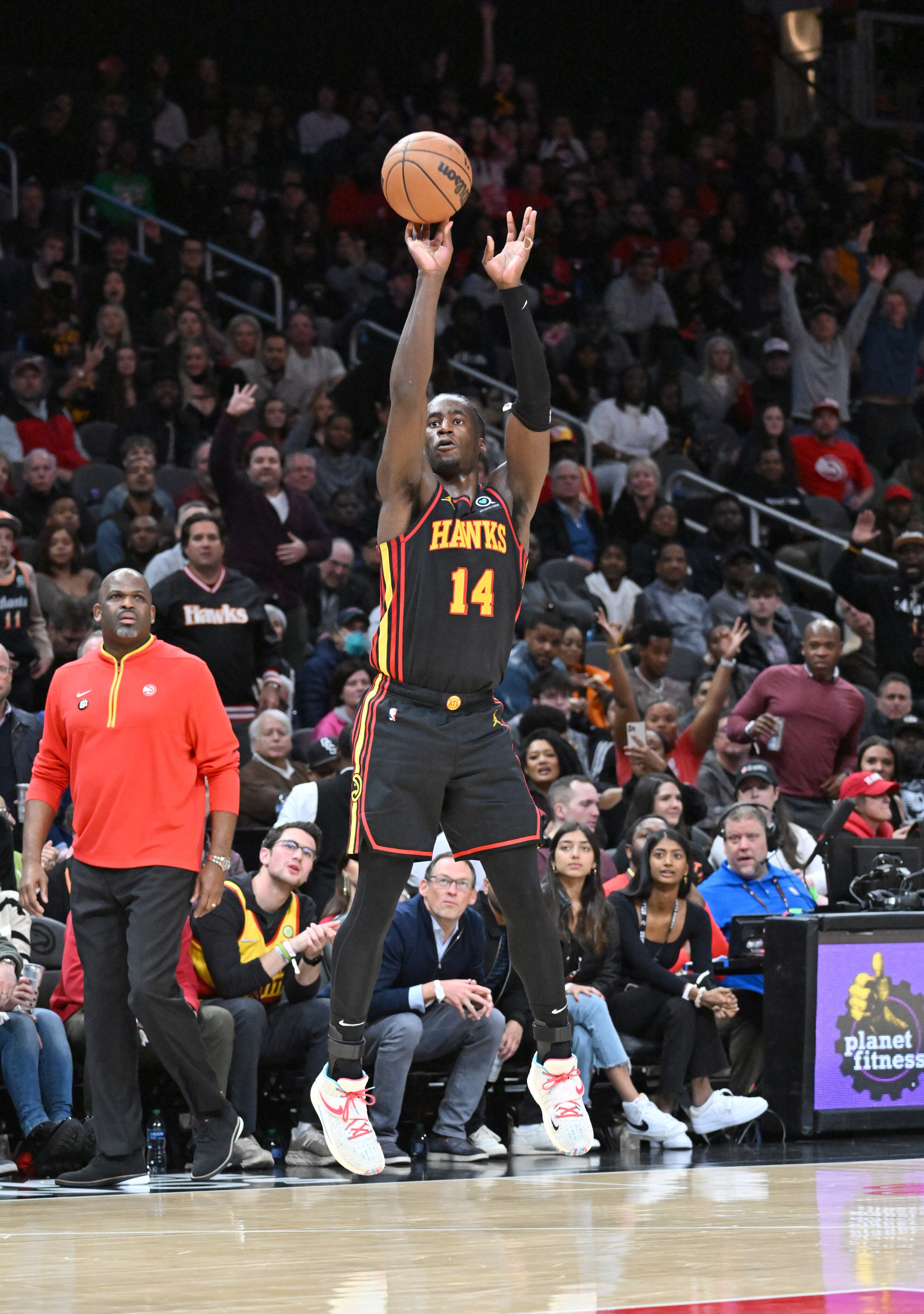Hawks' forward AJ Griffin shoots a 3-pointer during the second half against the Bulls at State Farm Arena on Wednesday, Dec. 21, 2022. The Bulls won 110 - 108. (Hyosub Shin / Hyosub.Shin@ajc.com)