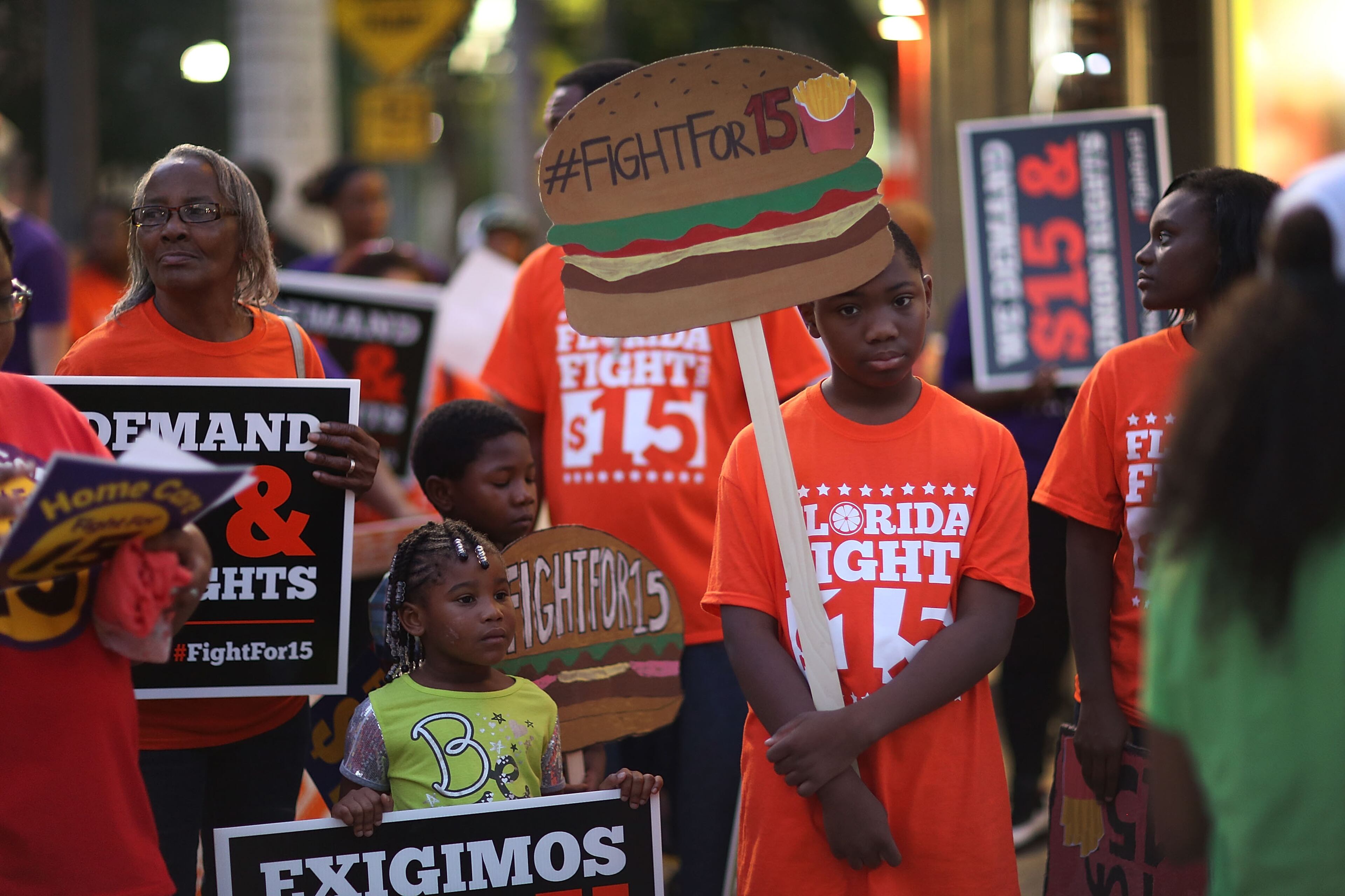 MIAMI, FL - NOVEMBER 10: Workers protest outside a McDonald's restaurant on November 10, 2015 in Miami, Florida. The protesters are demanding action from state legislators and presidential candidates to raise the minimum wage to $15 an hour. (Photo by Joe Raedle/Getty Images)