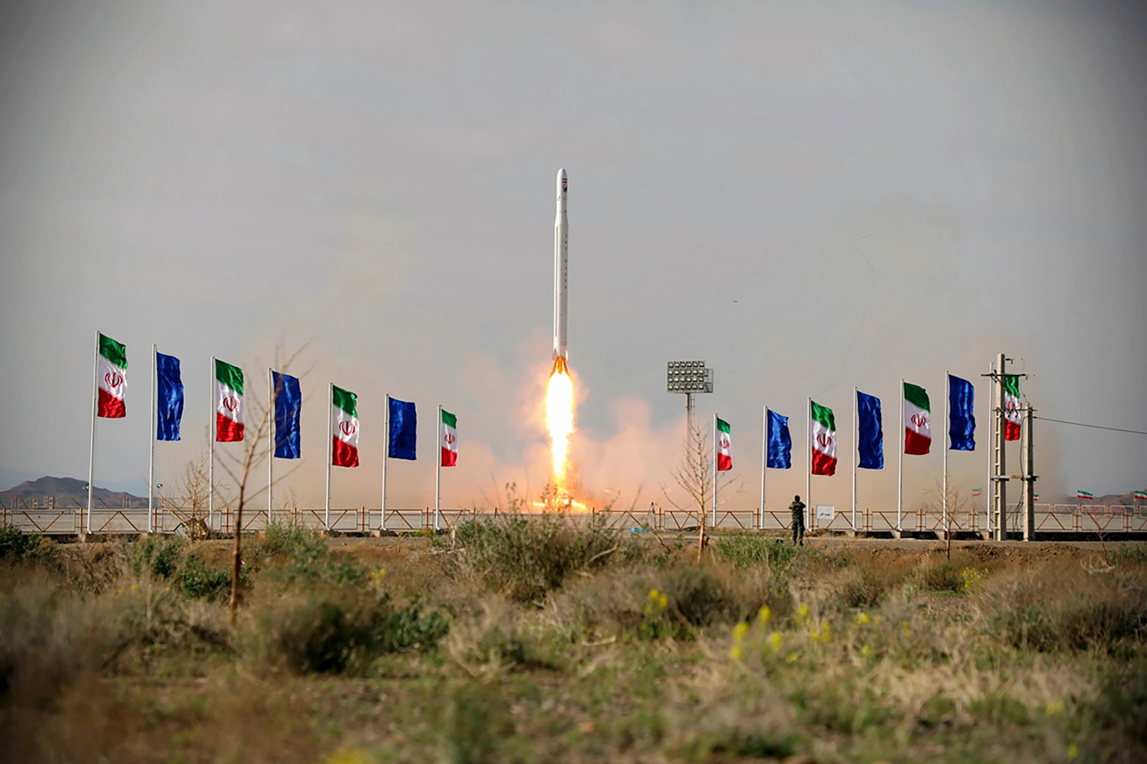 In this photo released Wednesday by Sepahnews, an Iranian rocket carrying a satellite is launched from an undisclosed site believed to be in Iran’s Semnan province.