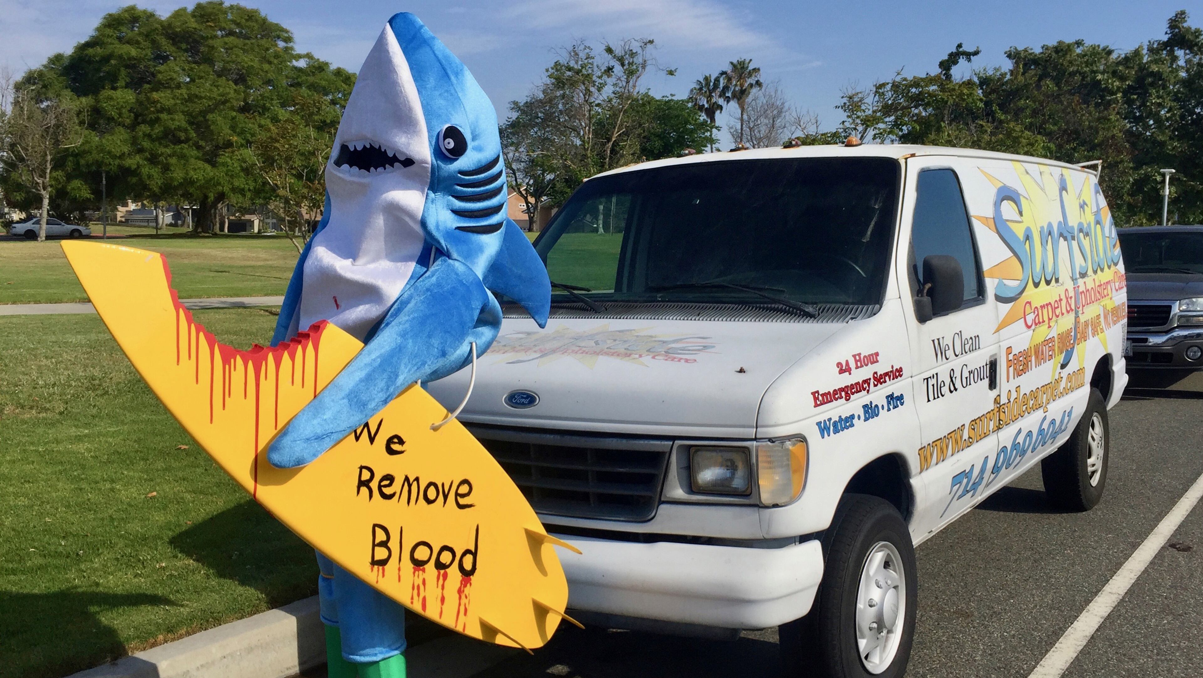 An influx of sharks along the Orange County coast in early 2017 has inspired some businesses to adopt shark themes. In May, the owners of Huntington Beachâs Surfside Carpet Cleaning set up a shark surfing mannequin on Magnolia Street with the slogan âWe remove blood.â Owner Laurie Fisser said âEveryone is thnking about sharksâ¦You have to have fun with it.â The promotion has brought in at least five new cleaning jobs, she said. (Margot Roosevelt/Orange County Register/TNS)