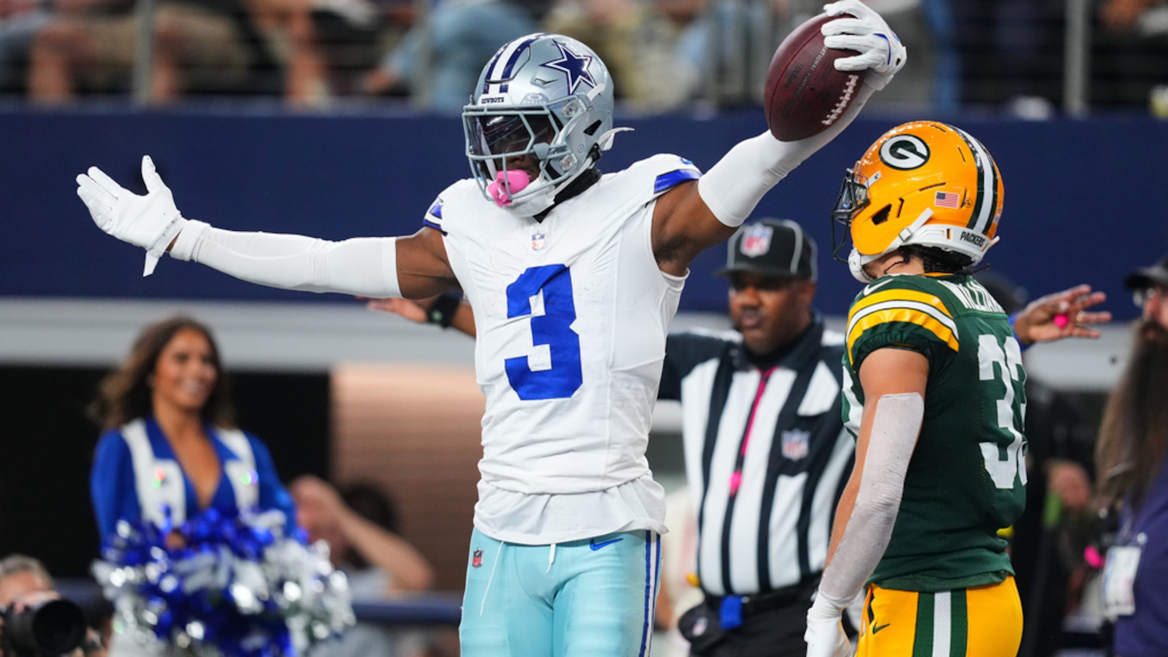 Dallas Cowboys' George Pickens celebrates in front of Green Bay Packers' Evan Williams after Pickens caught a pass late in the first half of an NFL football game Sunday, Sept. 28, 2025, in Arlington, Texas. (Julio Cortez/AP)