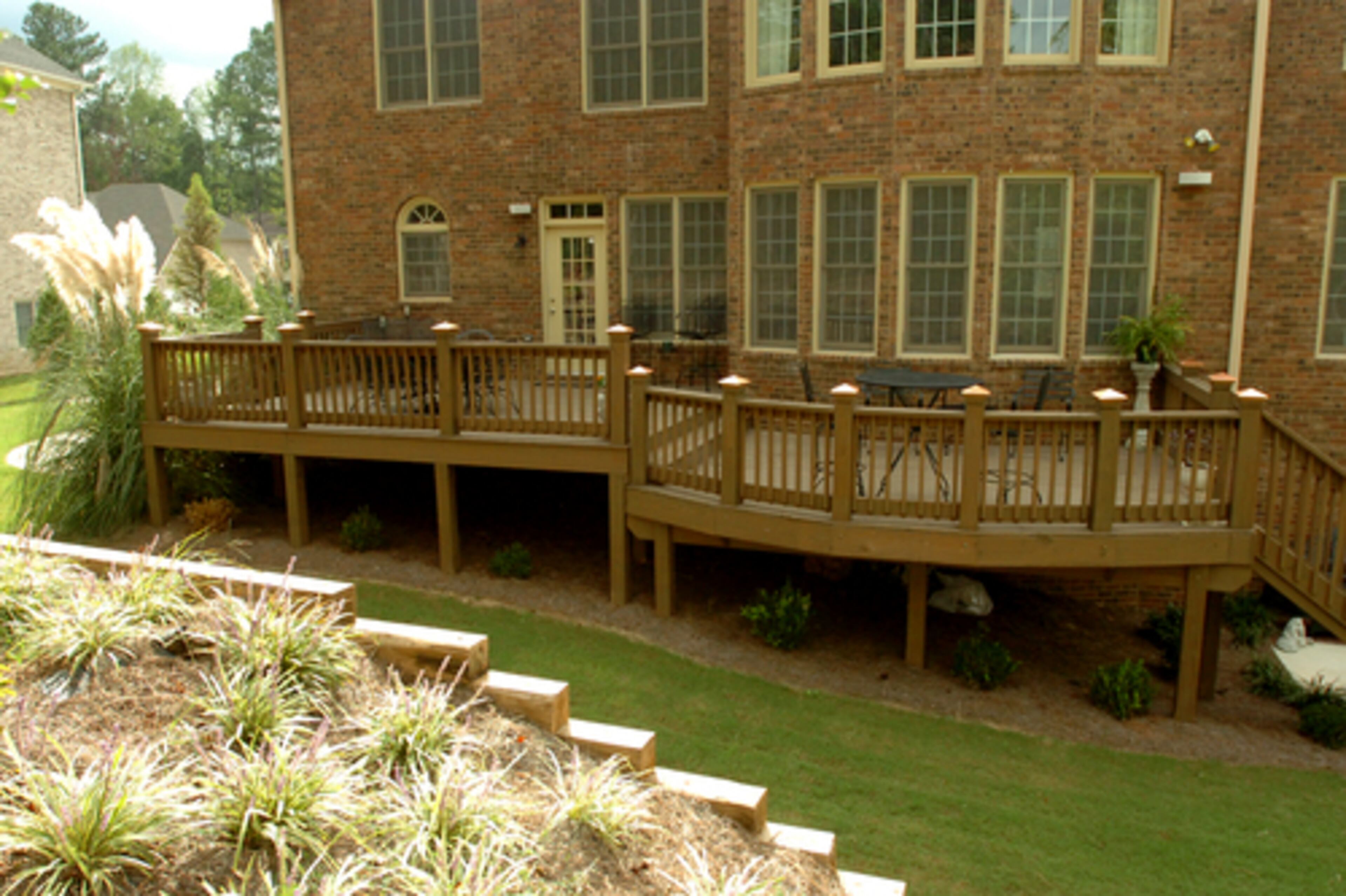 Spencer jazzed up the back deck by putting copper tops on the banisters. "I saw them a lot on upscale homes and it was something I always wanted," says Spencer. "So I went straight to Home Depot and got them. It kind of dresses the deck up." The removable tops range from $3 to $13, depending on finish, according to Spencer.
