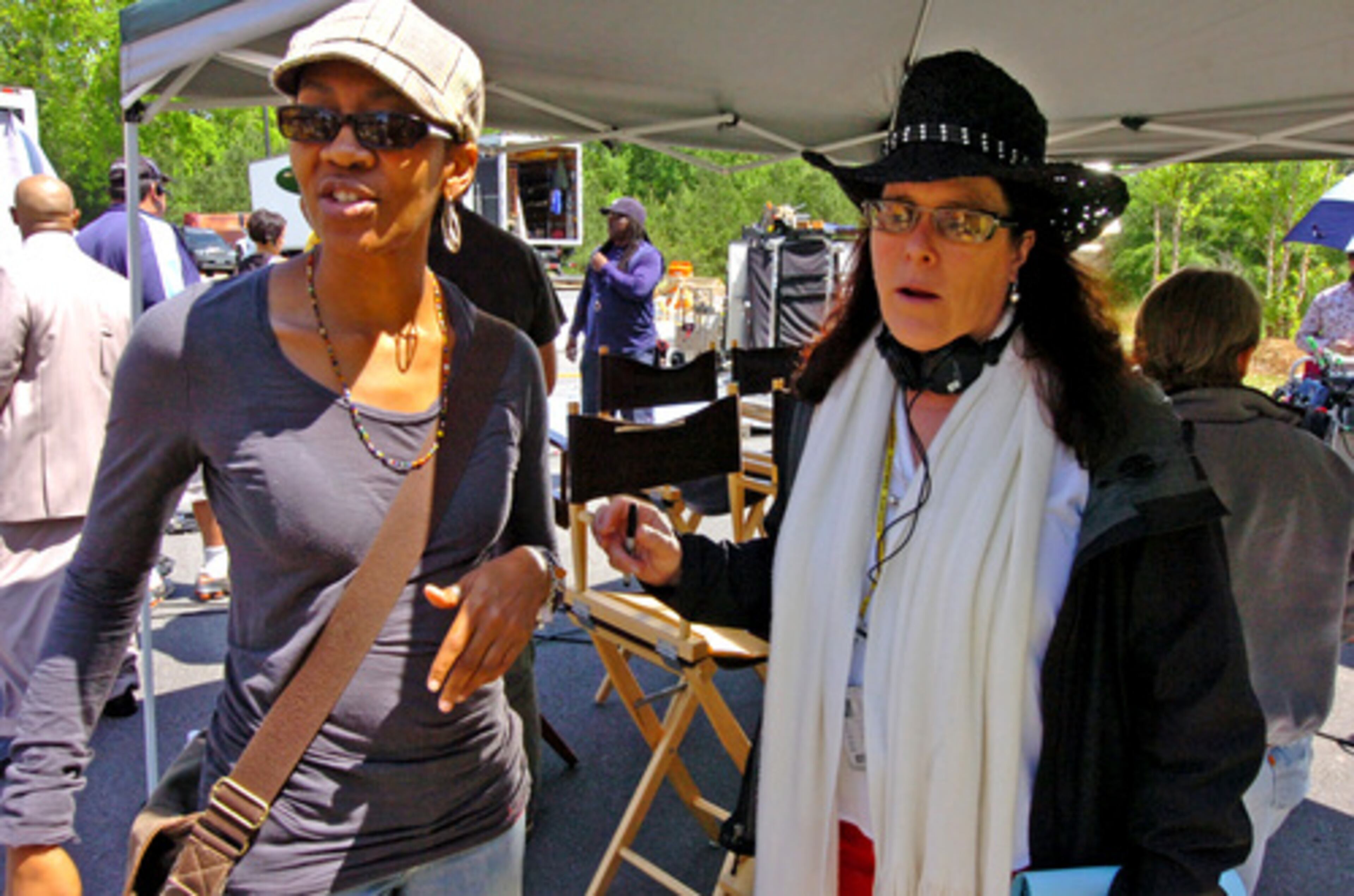 Rhonda Baraka and producer Carol Ann Shine keep tabs on what's happening on the set of "Pastor Brown." Baraka says she wrote the original script in two weeks.