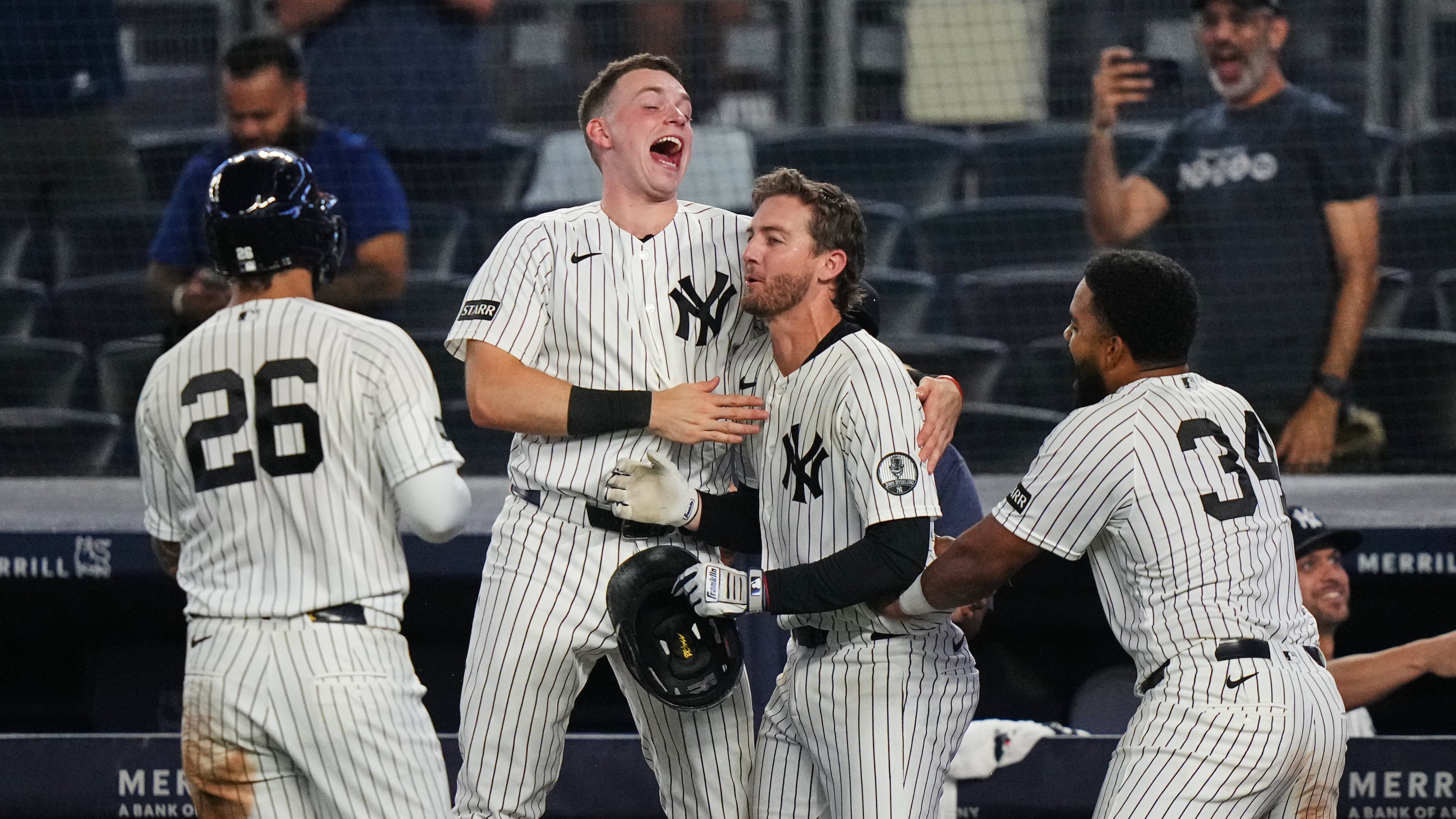 New York Yankees' Ryan McMahon, center, celebrates with Heliot Ramos, right, Ben Rice, second from left, and Luis García Jr. after a baseball game against the Atlanta Braves Saturday, Aug. 8, 2026, in New York. (AP Photo/Frank Franklin II)
