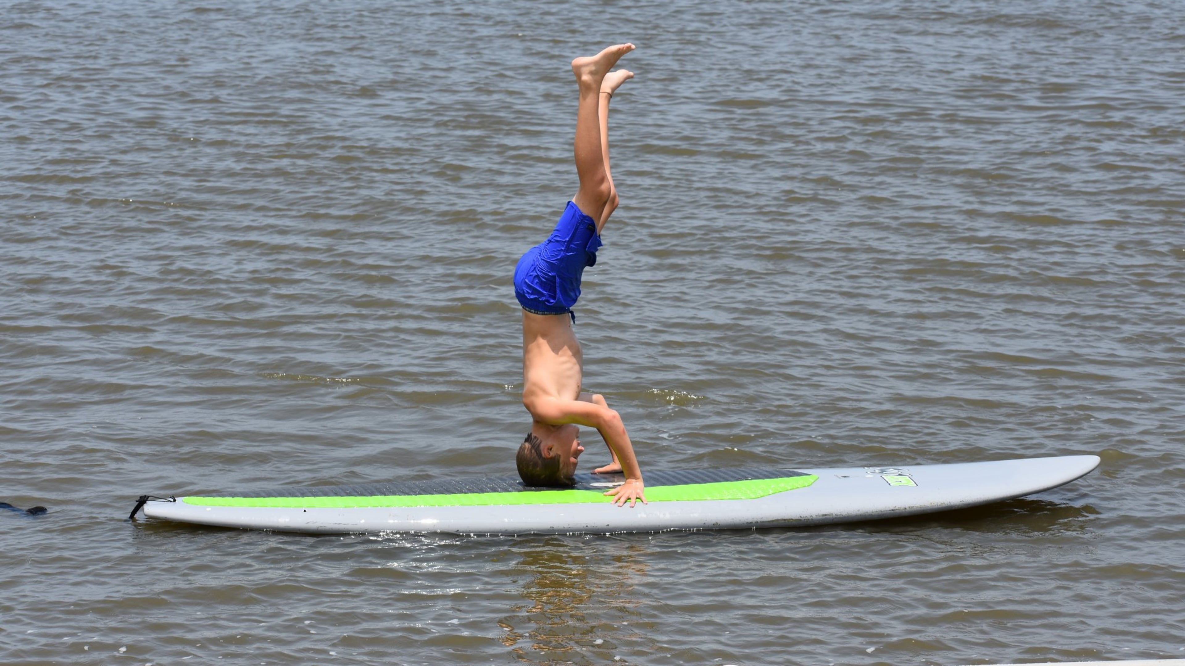 Pround grandpa,Stephen Margolis, shared this photo of his 13-year-old grandson, Isaac Wright, taking a respite from swimming at St. Simon’s Island to do some “windsurfing” this summer.
