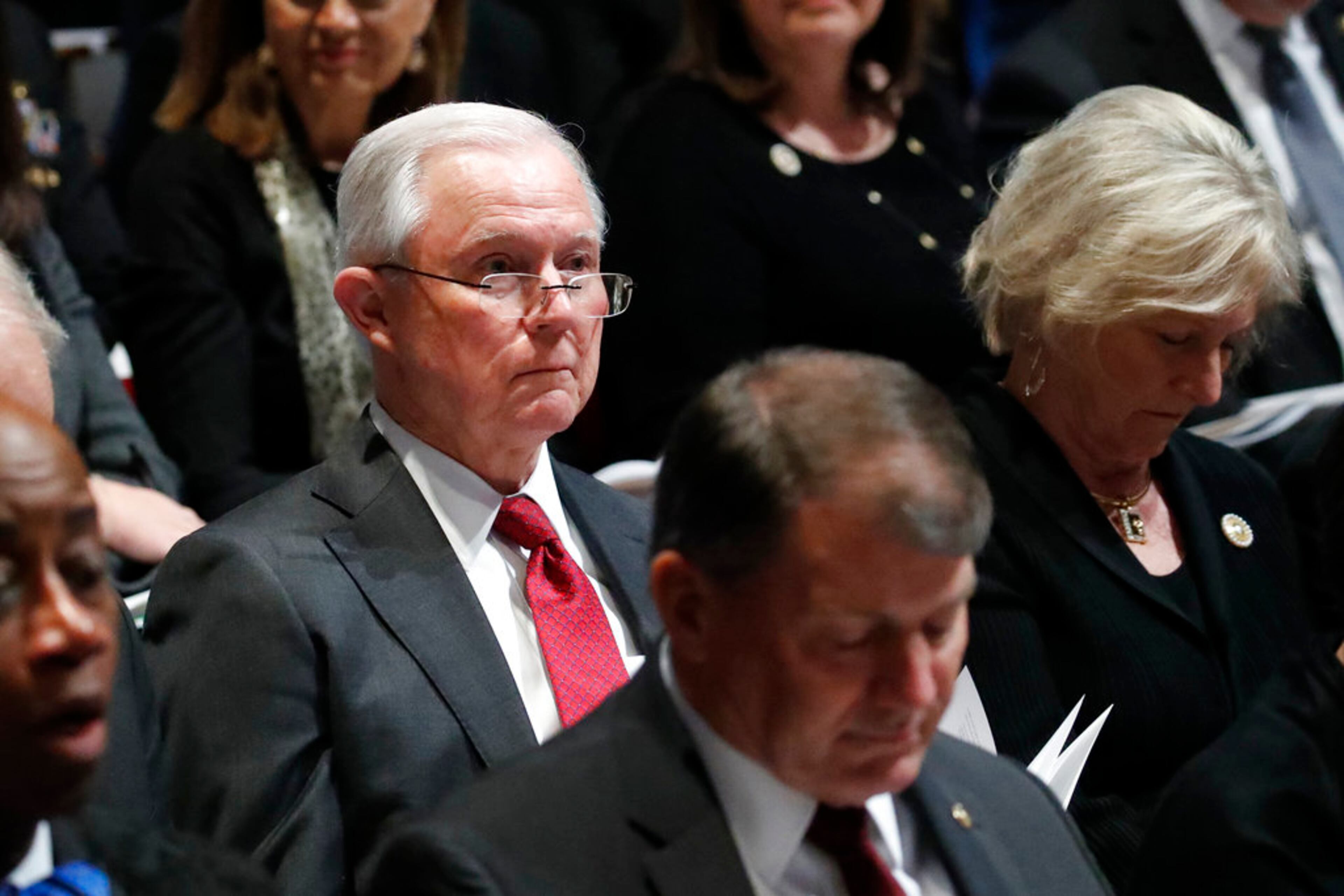 Former Attorney General Jeff Sessions listens during the State Funeral for former President George H.W. Bush at the National Cathedral, Wednesday, Dec. 5, 2018, in Washington. (AP Photo/Alex Brandon, Pool)