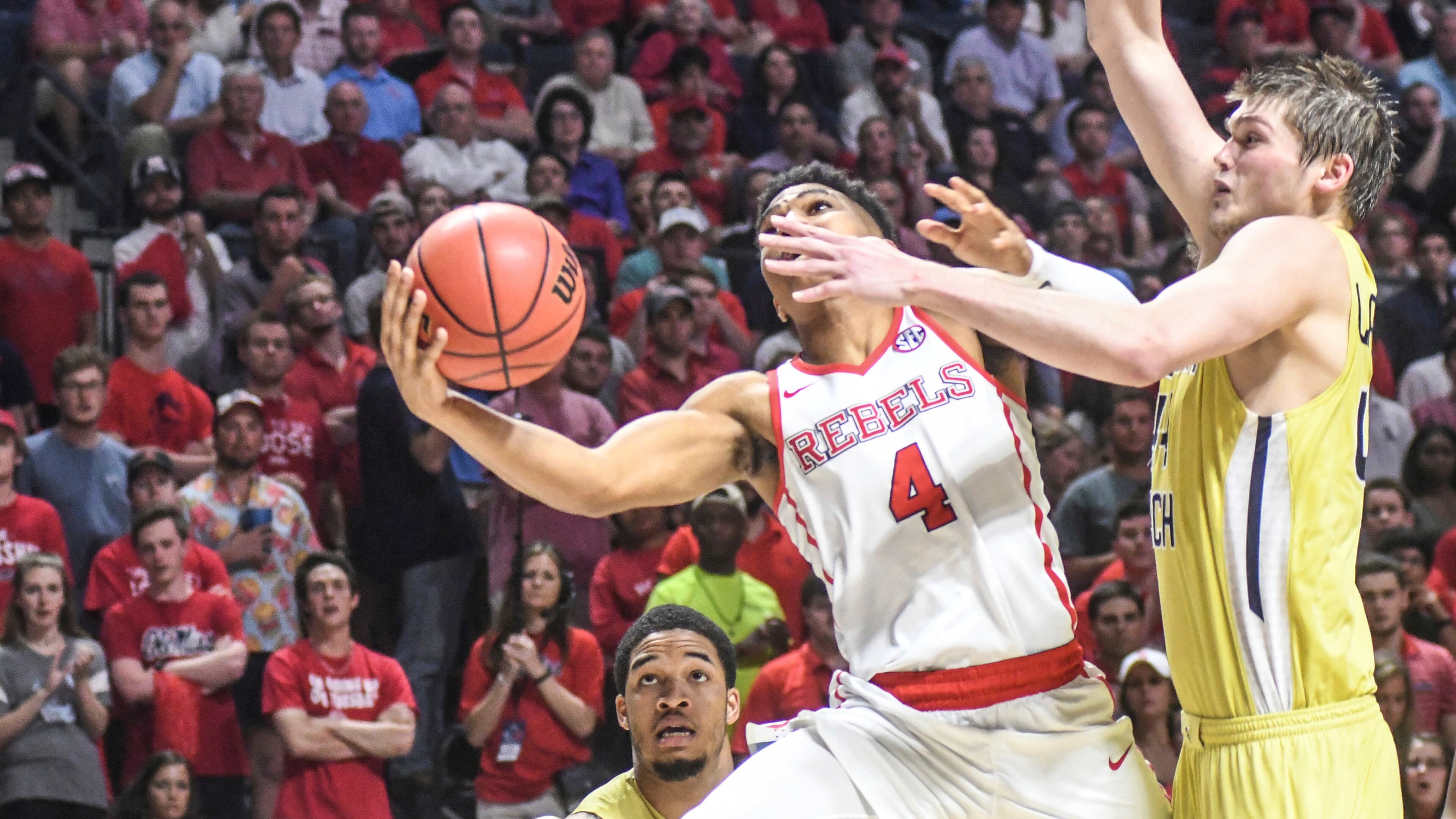 Mississippi guard Breein Tyree (4) shoots against Georgia Tech guard Tadric Jackson (1) and center Ben Lammers (44) during an NCAA college basketball game in the quarterfinals of the NIT on Tuesday, March 21, 2017, in Oxford, Miss. (Bruce Newman/The Oxford Eagle via AP)
