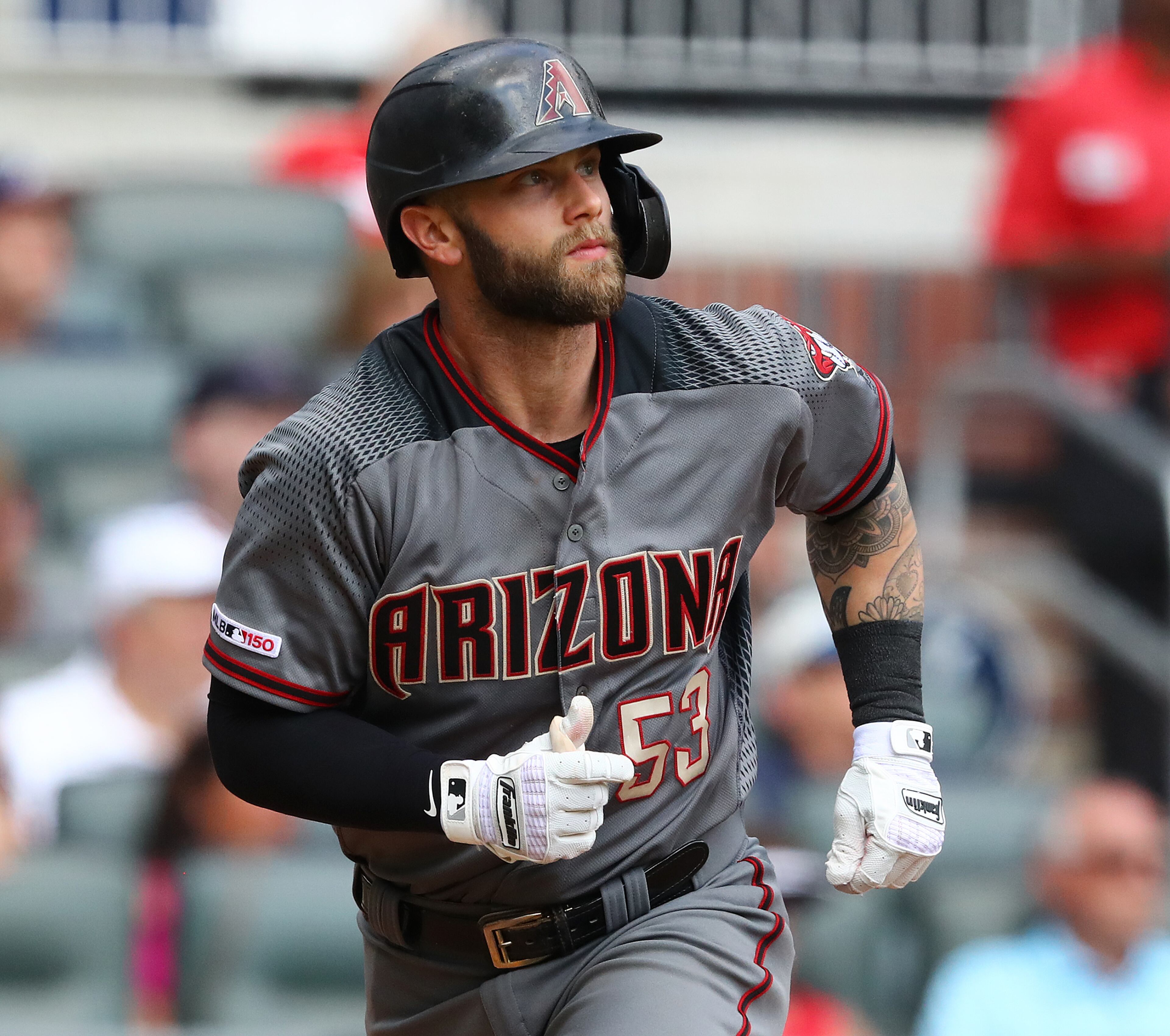 Arizona Diamondbacks' Christian Walker watches his 2-RBI home run leave the park for a 3-0 lead over the Atlanta Braves during the seventh inning. Curtis Compton/ccompton@ajc.com
