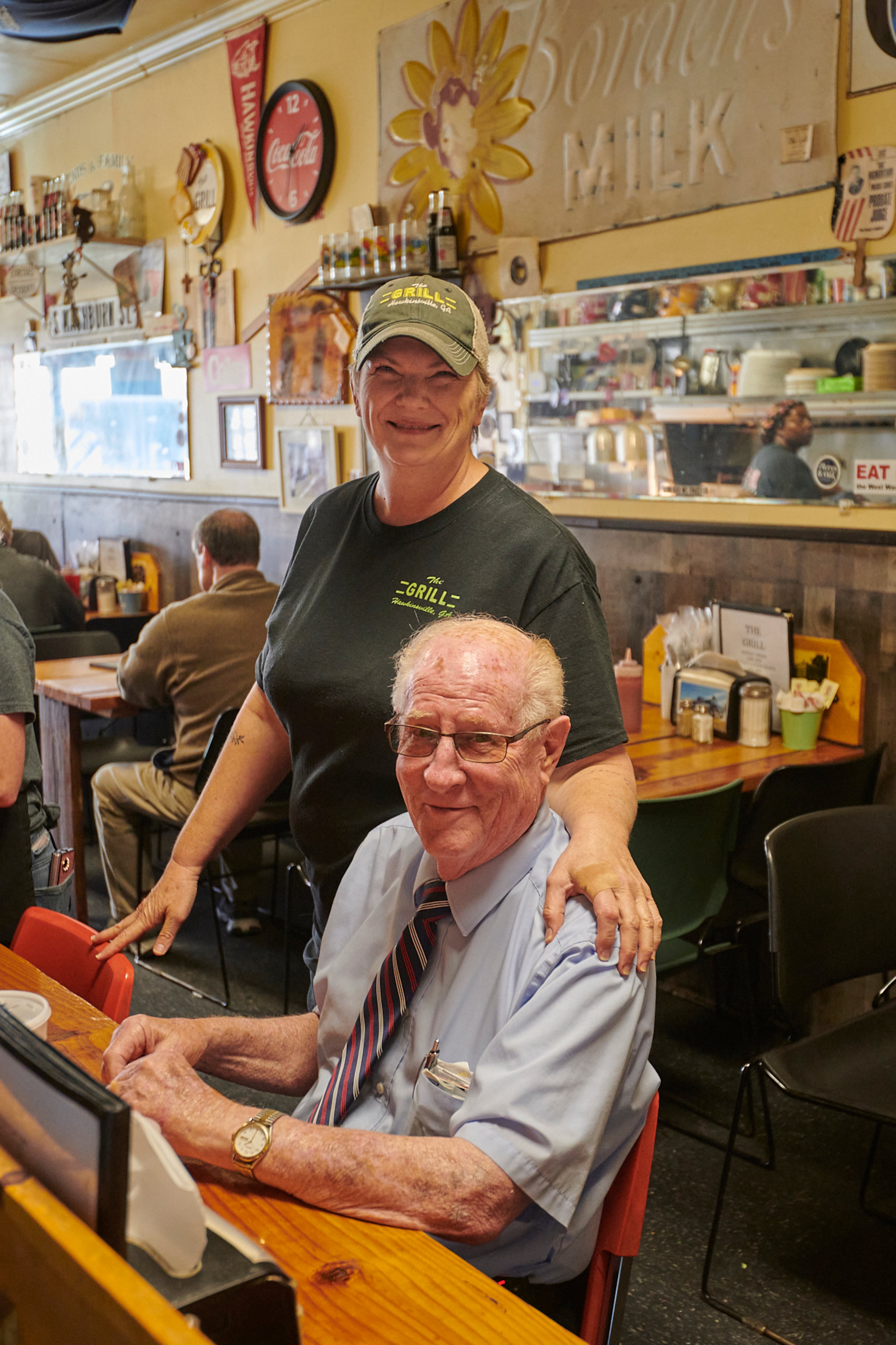 Owner Paula Nixon greets a customer at the Grill in Hawkinsville. (Greg Rannells for The Atlanta Journal-Constitution)