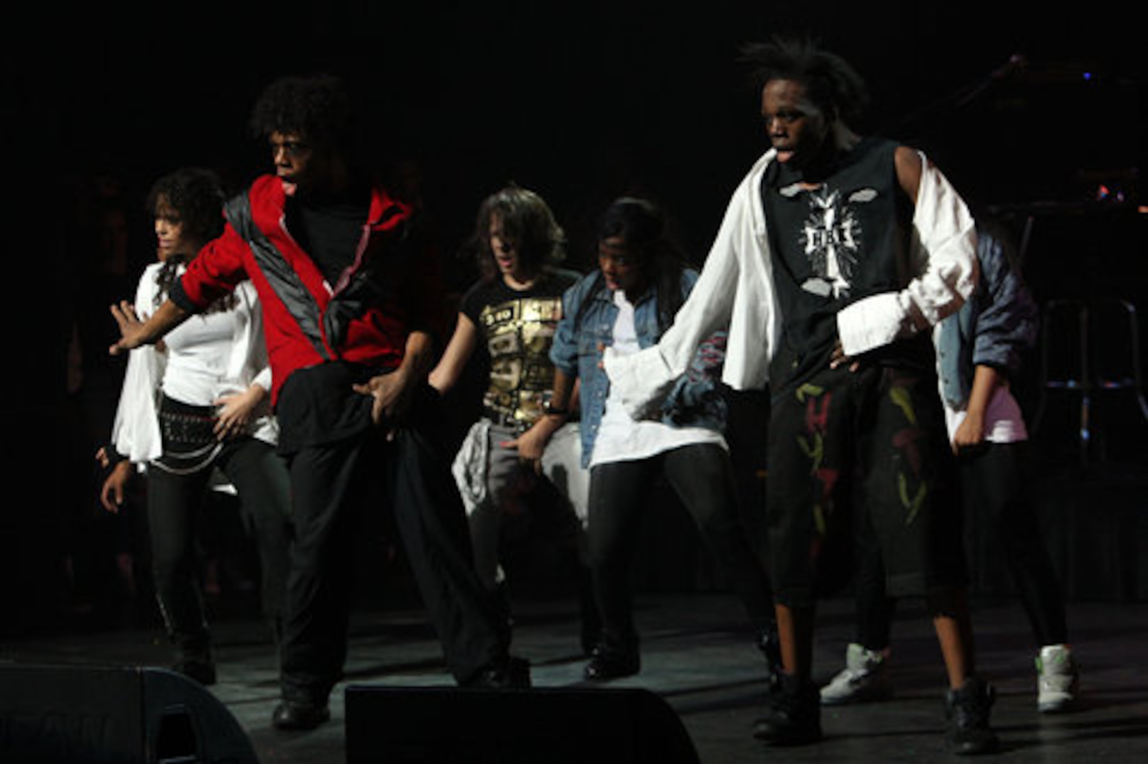 Rythem City dancers got the crowd going with a "Thriller" dance. In 1967, the Jackson 5 won Amateur Night at the Apollo when Michael Jackson sang the Motown hit "Who's Lovin' You."