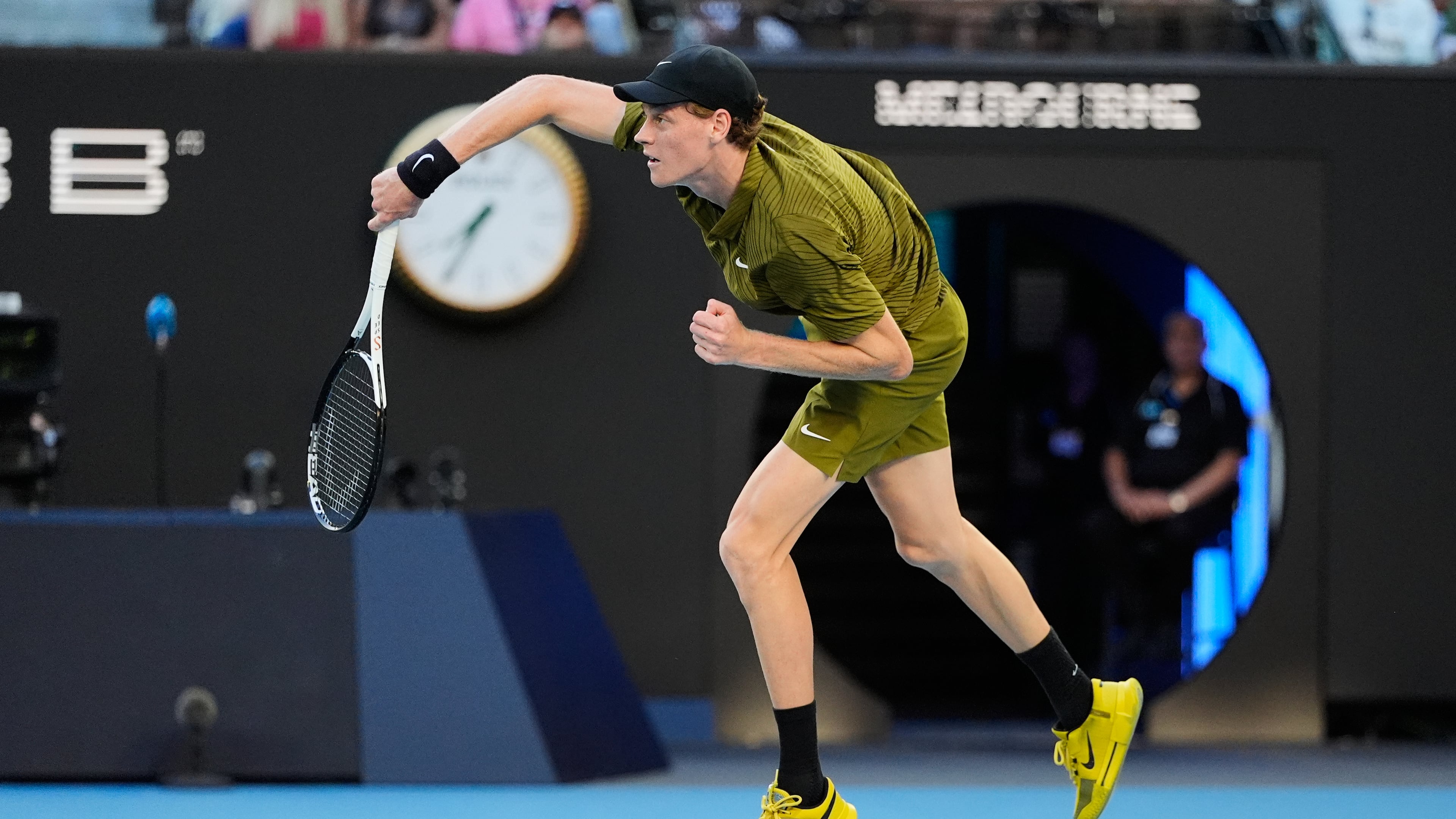 Jannik Sinner of Italy serves to Hugo Gaston of France during their first round match at the Australian Open tennis championship in Melbourne, Australia, Tuesday, Jan. 20, 2026. (AP Photo/Asanka Brendon Ratnayake)