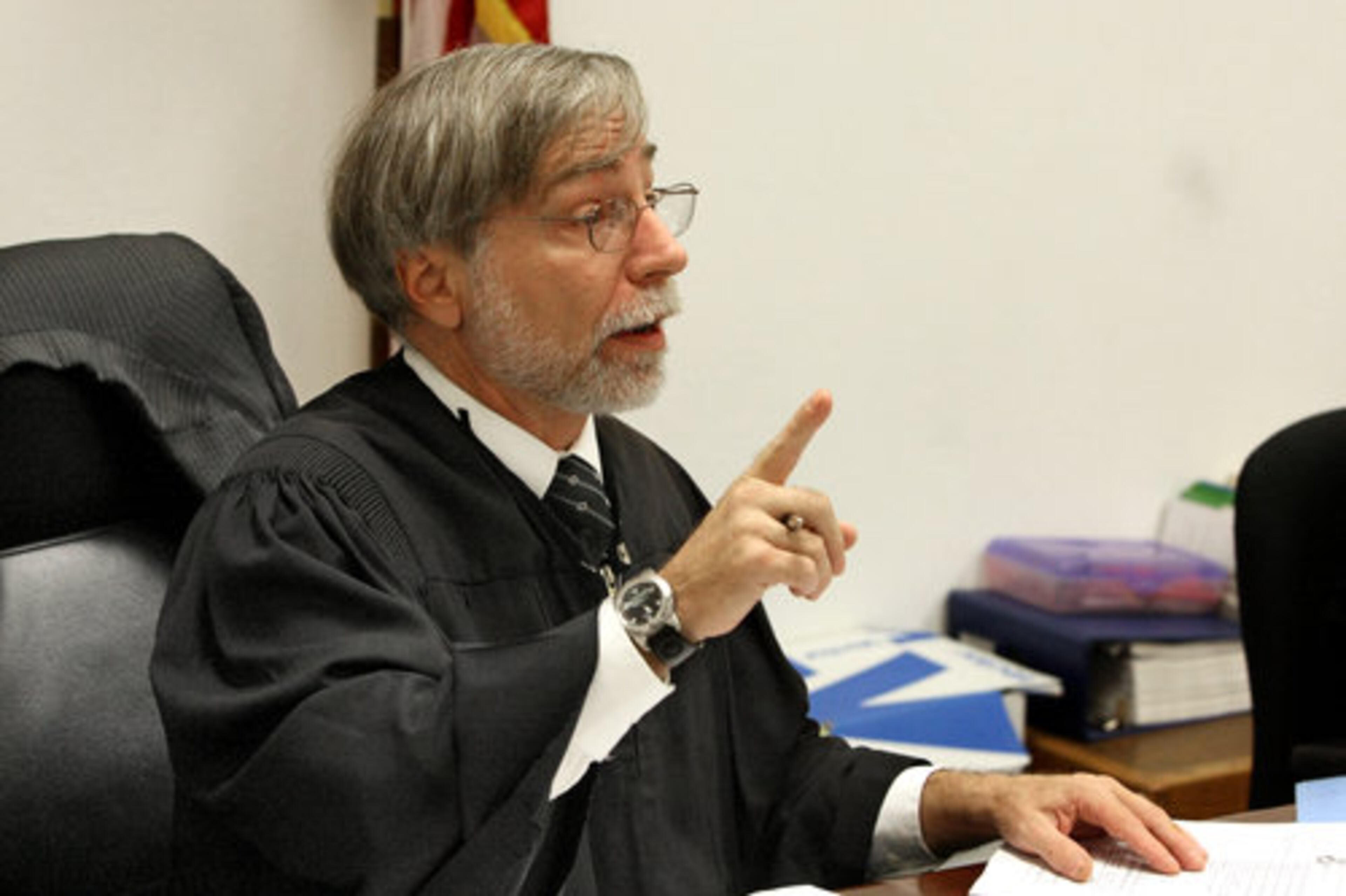 Judge James Altman reads the charges against Amiee Michael.
