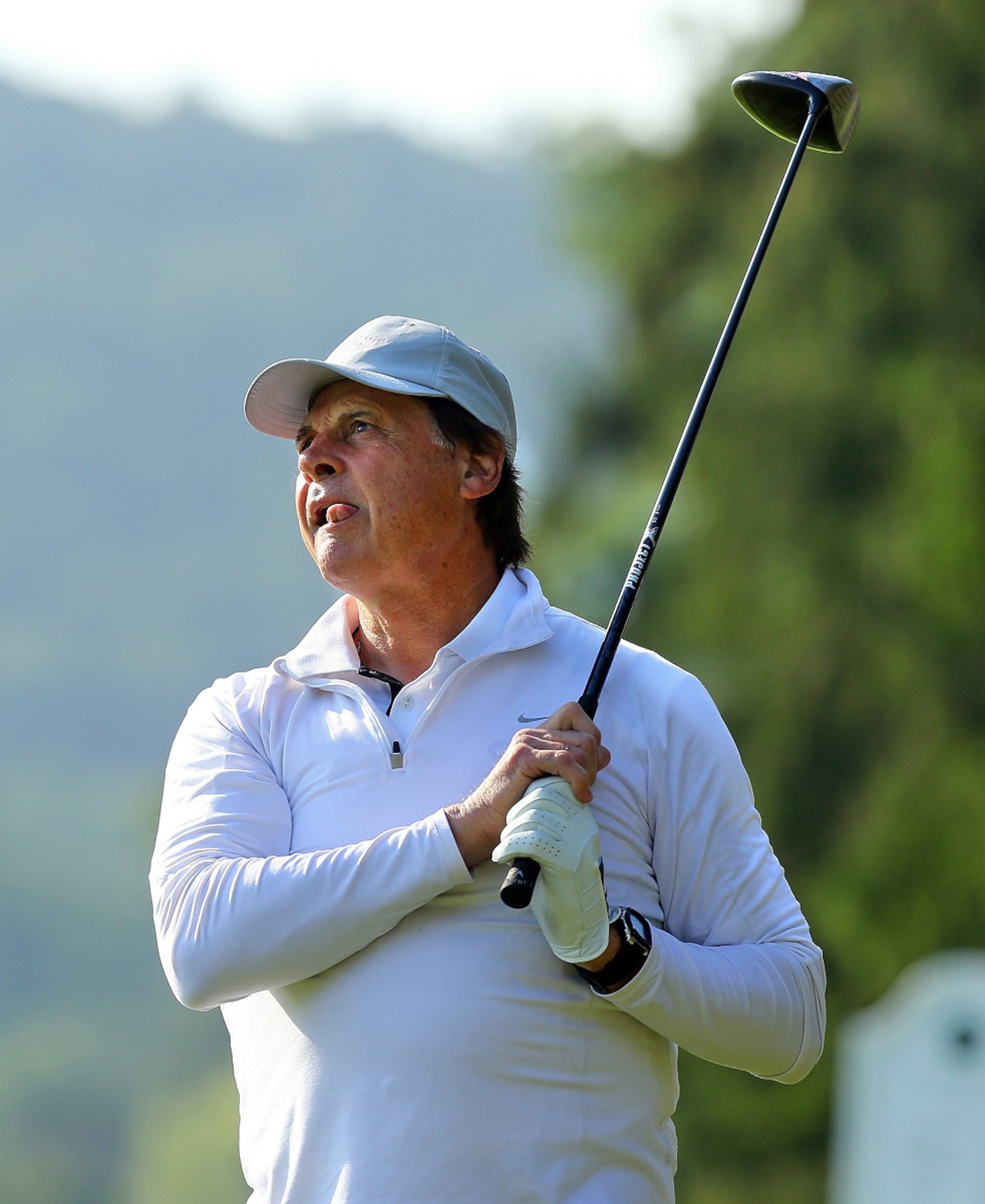 Tony LaRussa watches his drive as he tees off on the 6th hole during the Hall of Famer Golf Tournament.