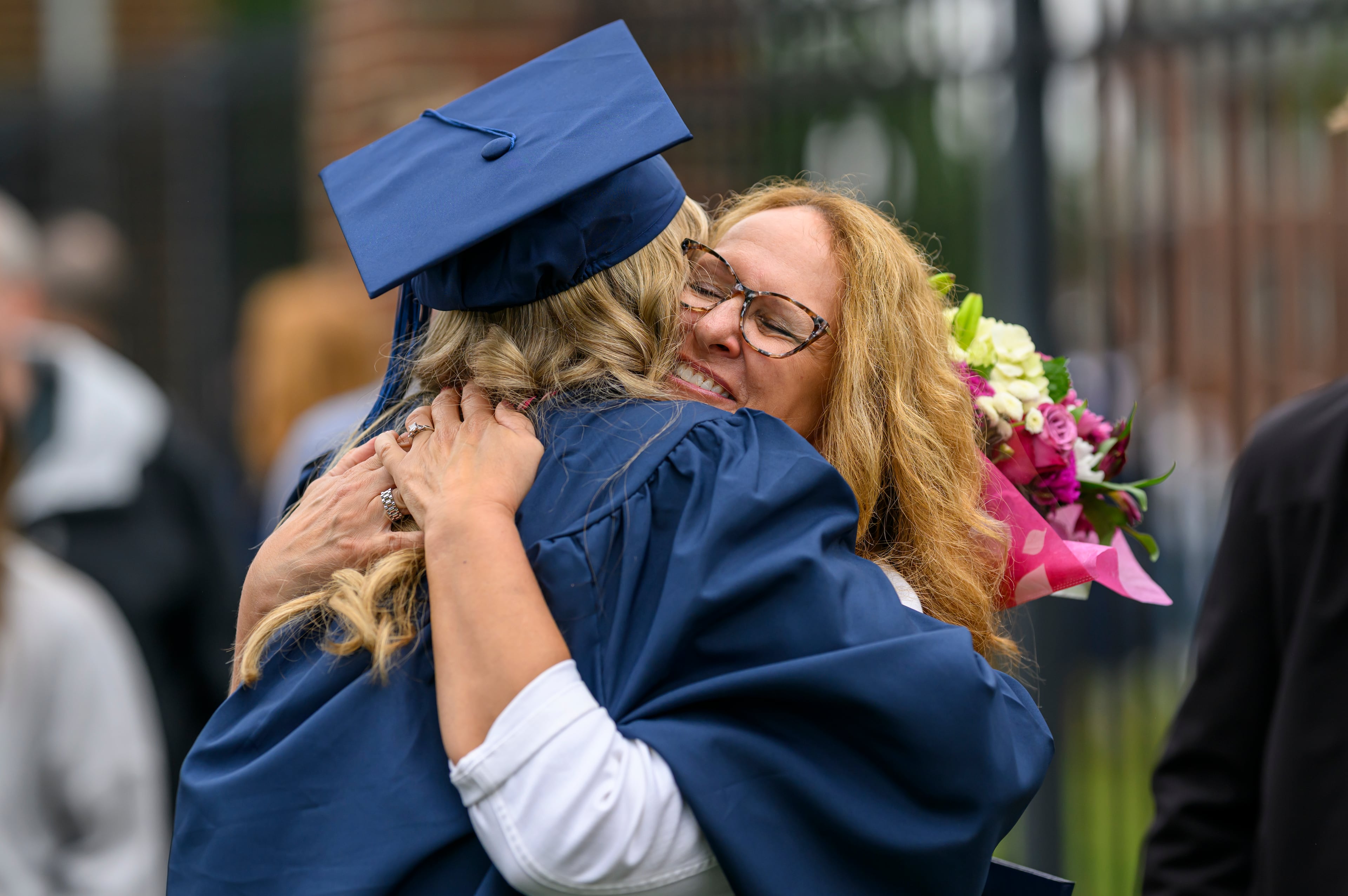 Berry College graduate Kara Schmit gets a hug from her mom, Sue Schmit, Saturday, May 9, 2026. (Courtesy of Brant Sanderlin/Berry College)