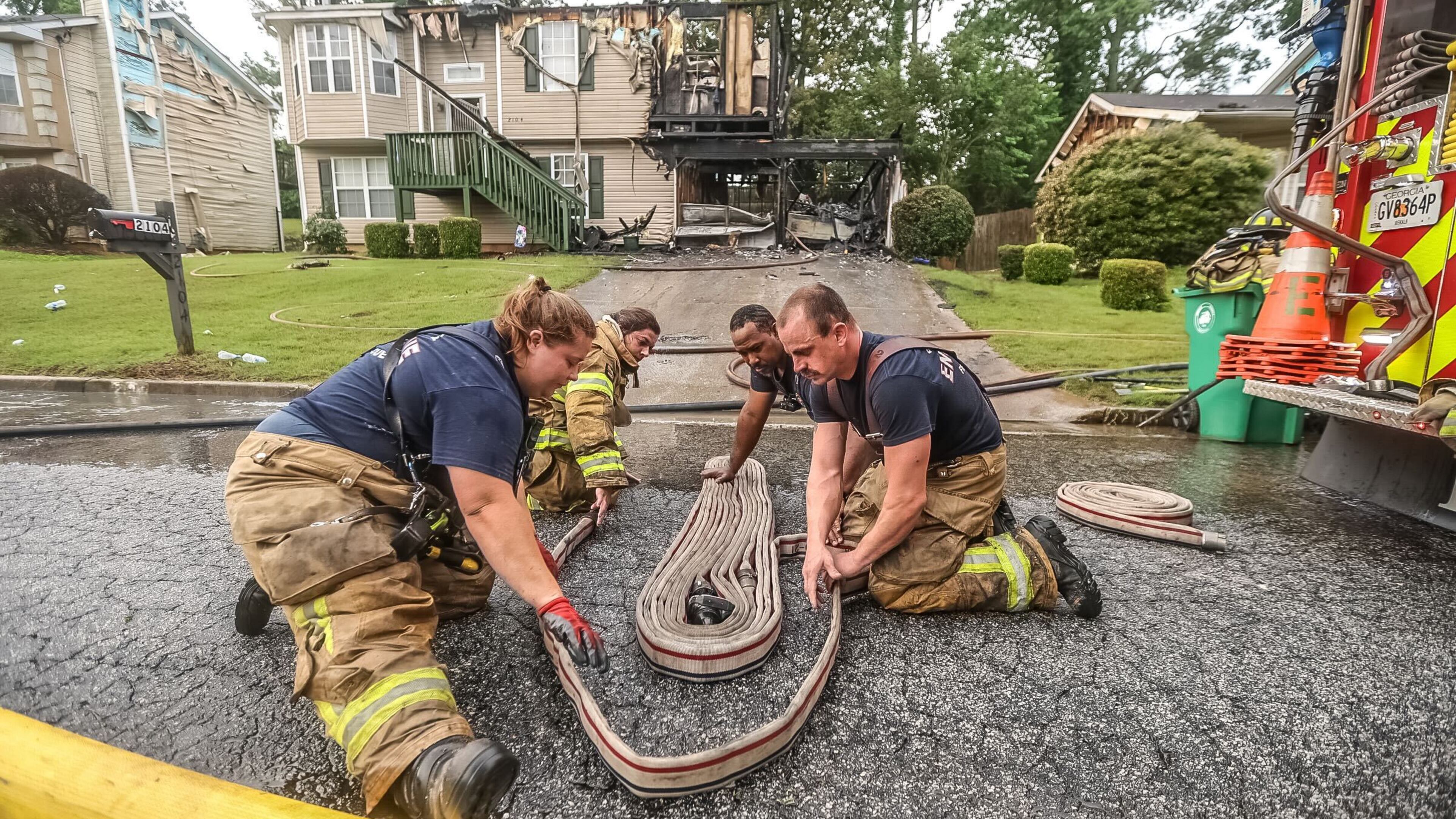 A house fire early Monday morning in Lithonia has left four people and two dogs displaced.
