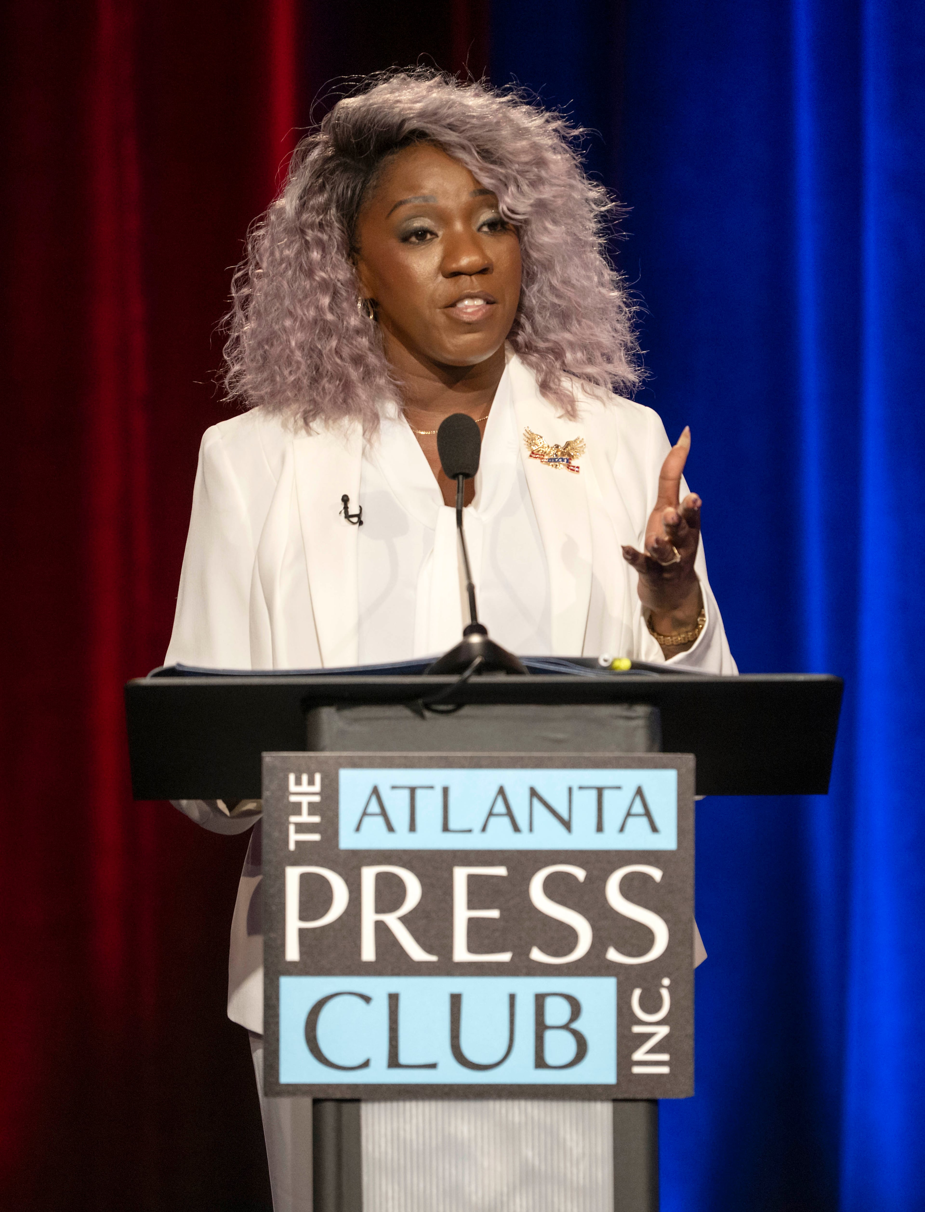 The Democratic candidate for Georgia Labor Commissioner, Nikki Porcher, debates incumbent Republican Labor Commissioner Barbara Rivera Holmes (not shown) at the Atlanta Press Club's Loudermilk-Young Debate Series held Tuesday, Oct. 13, at the studios of Georgia Public Broadcasting. (Pool photo by Brian Cahn)