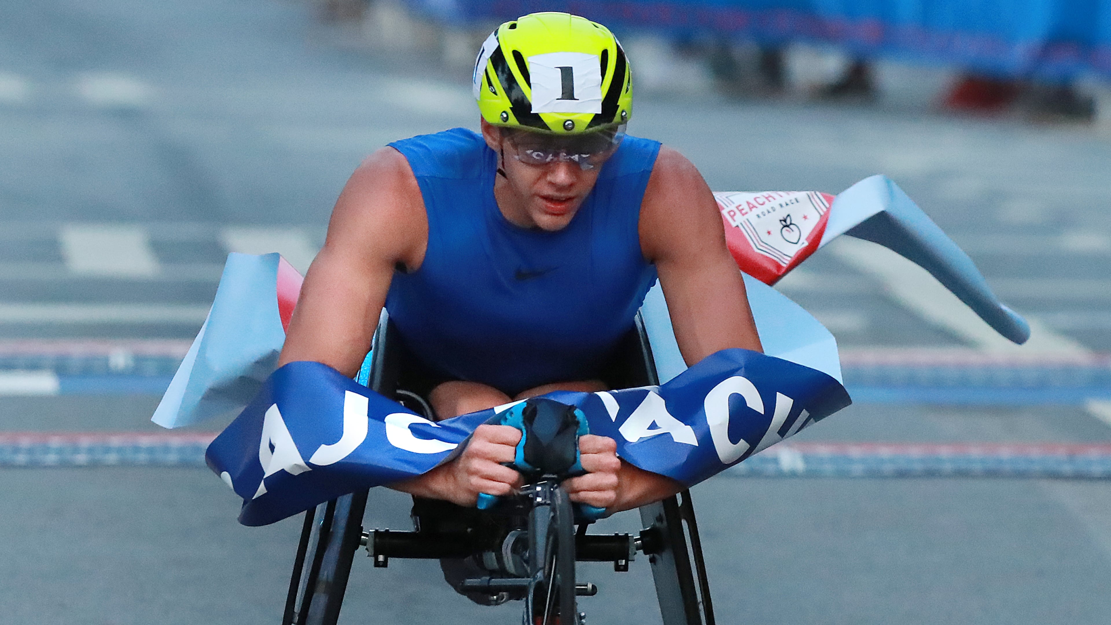 Daniel Romanchuk wins the men's wheelchair race in the AJC Peachtree Road Race on Wednesday, July 4, 2018, in Atlanta. Curtis Compton/ccompton@ajc.com