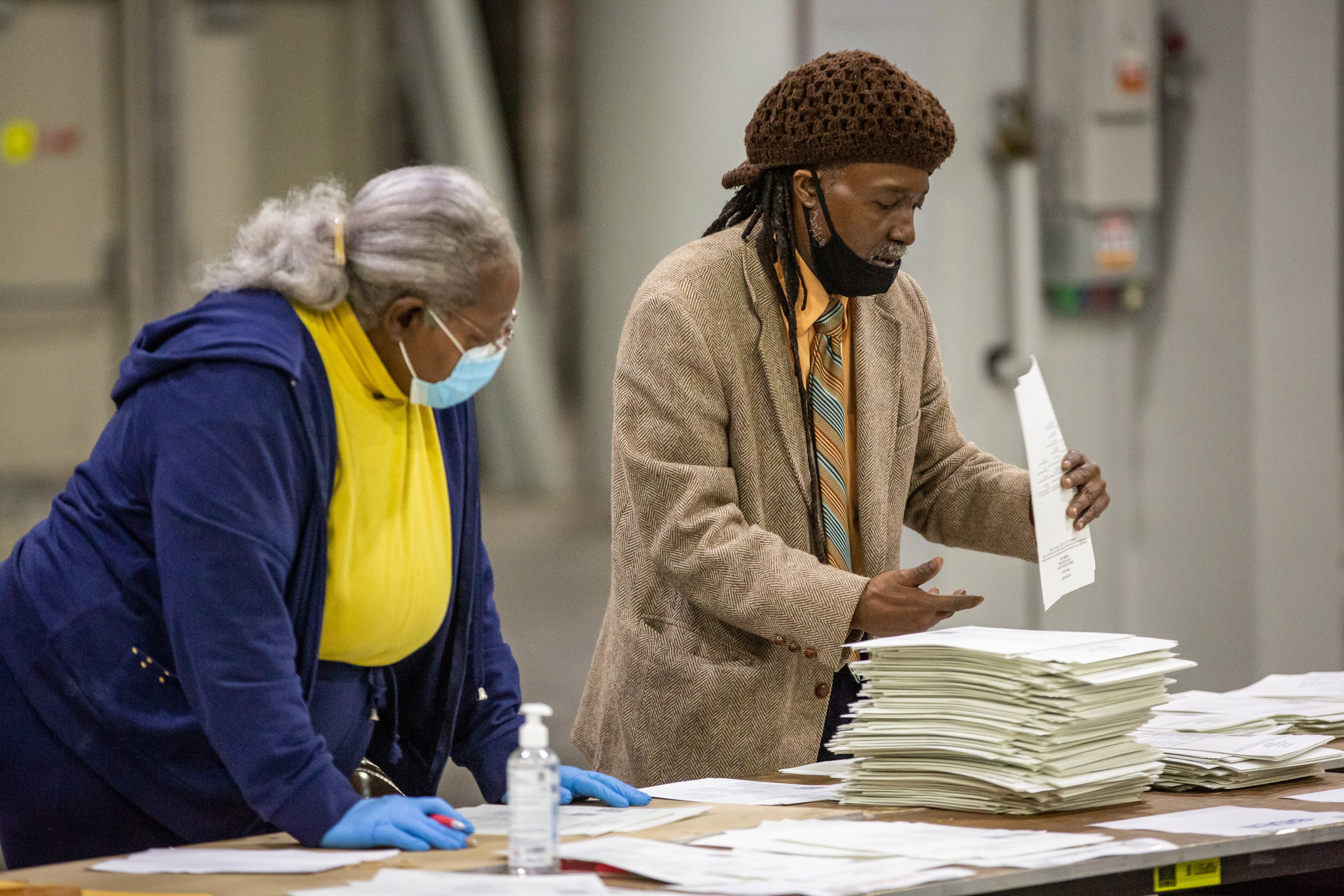 Fulton County election workers count the last of the presidential ballots at the Georgia World Congress Center on Sunday, November 15, 2020. STEVE SCHAEFER / SPECIAL TO THE AJC