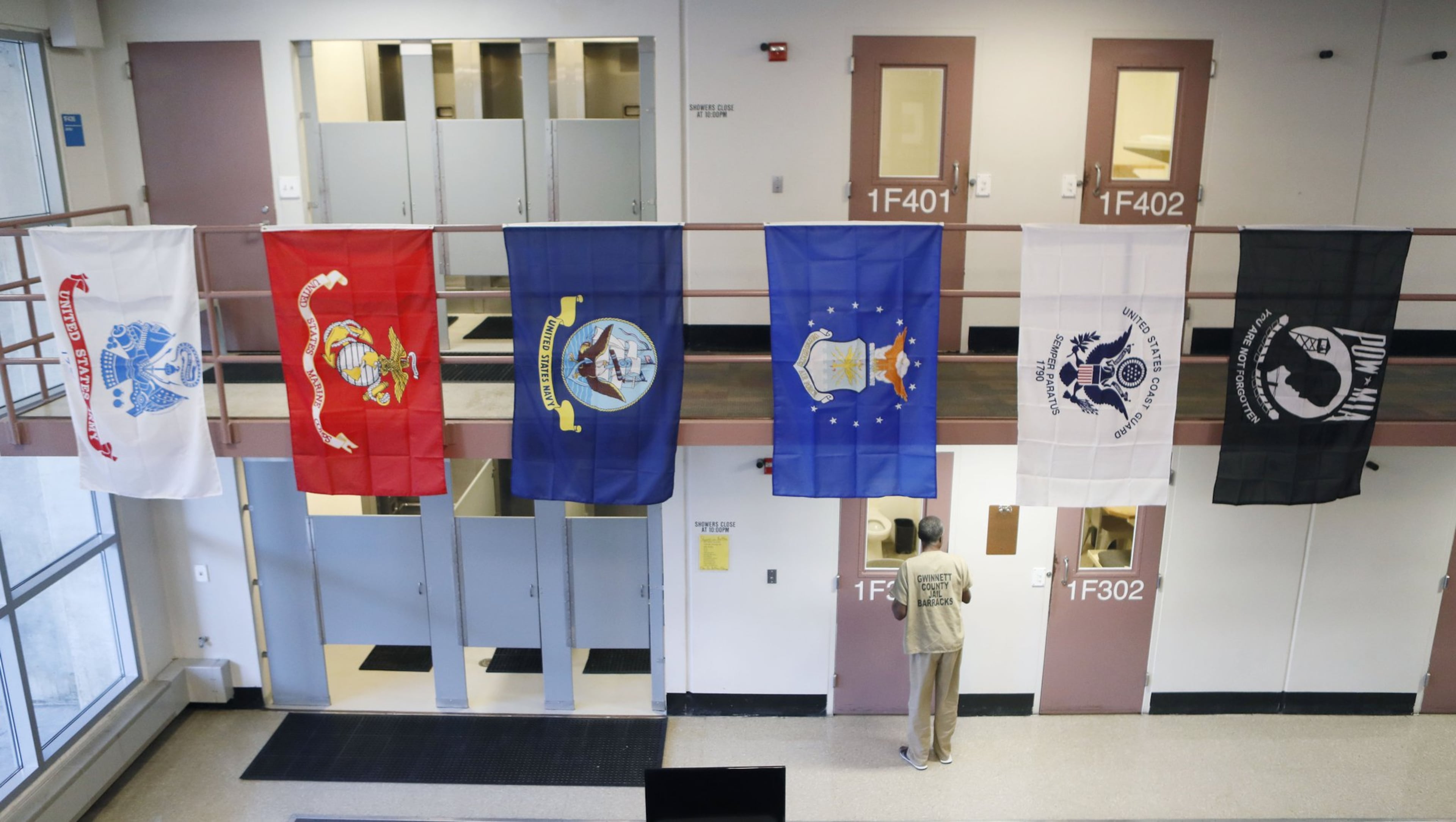 November 20, 2019 - Lawrenceville - “The Barracks” is decorated with flags from all of the armed forces. The Gwinnett County jail has designated a new housing unit just for inmates who are military veterans. “The Barracks” is intended to be a therapeutic, 70-bed unit focused on providing the type of support crucial to helping incarcerated veterans make a successful transition back into the community. Bob Andres / robert.andres@ajc.com