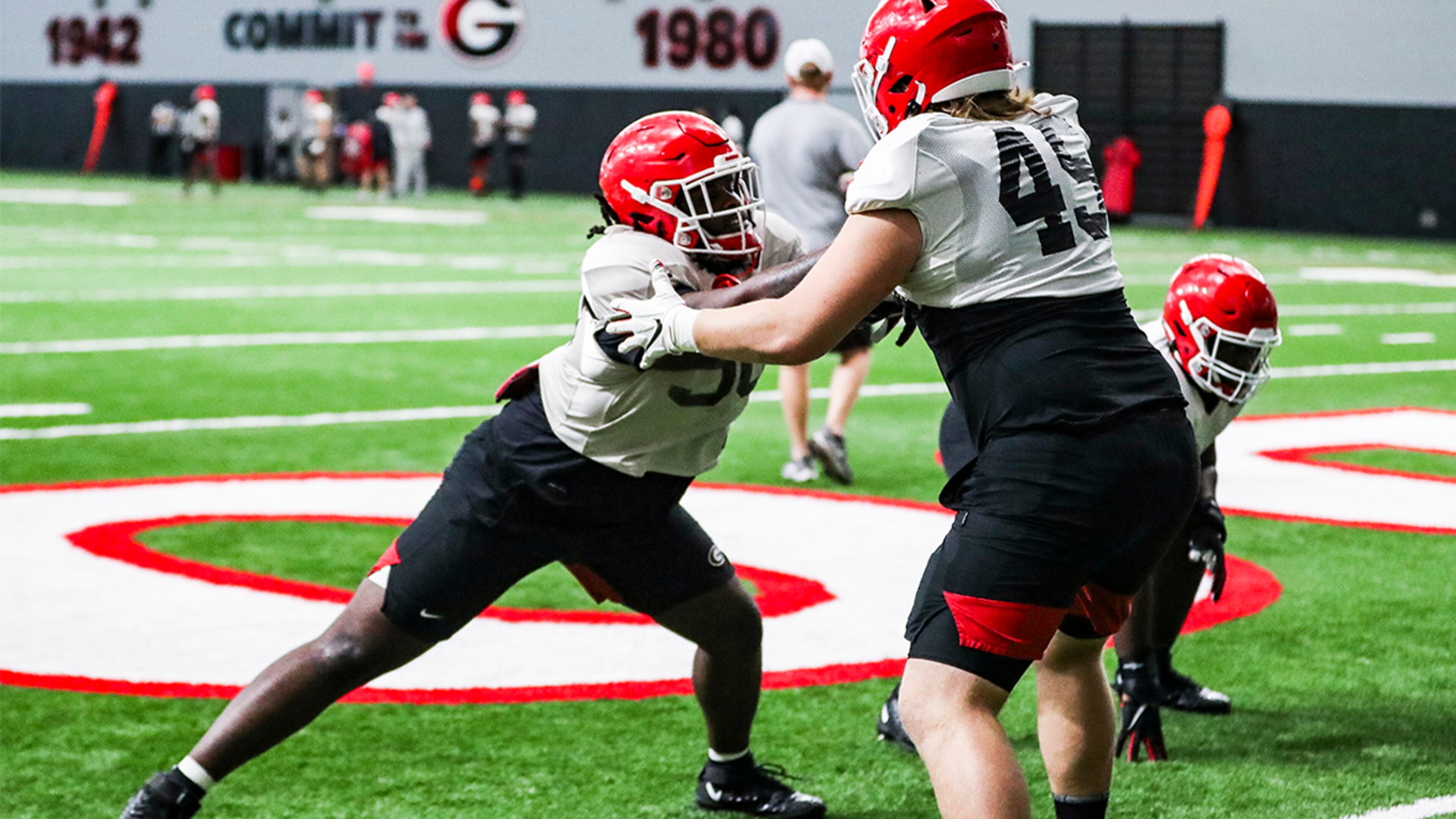 Georgia defensive lineman Tramel Walthour (90) works with teammates during the Bulldogs’ practice session ahead of the Chick-fil-A Peach Bowl Bowl Tuesday, Dec. 29, 2020, in Athens. (Chamberlain Smith/UGA Sports)