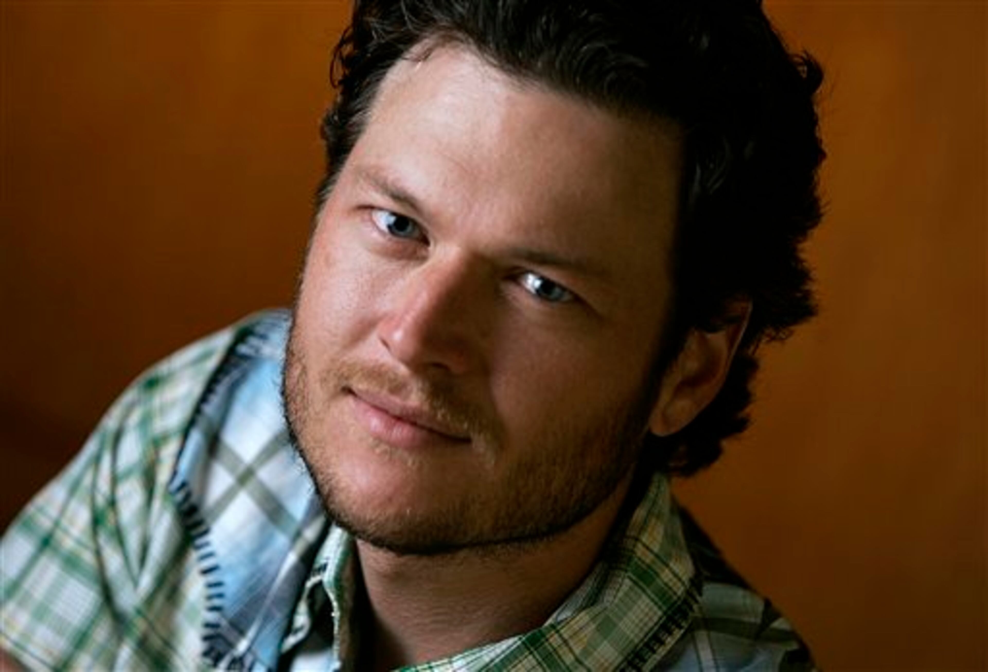 Country singer Blake Shelton is shown April 18, 2007 in Nashville, Tenn. If Shelton comes across as a little gloomy on his new album "Pure BS," he has good reason. He was going through a divorce when he was making it, and he says he had a lot on his mind. Eight of the 11 songs deal with relationships gone wrong, from the guy trying desperately to hold onto his girl in "Don't Make Me" to the one who runs into his ex- and her new beau in "I Don't Care." (AP Photo/Mark Humphrey)