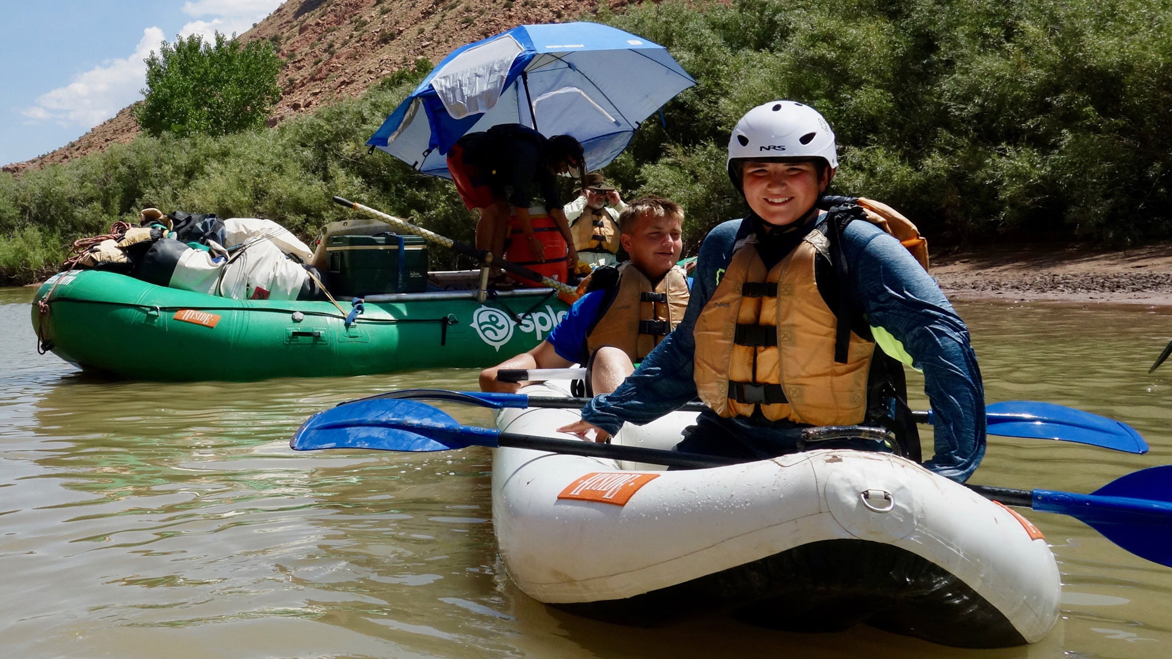 Chayse Buchta, left, and Justin Buchta, right, after navigating the Duckie inflatable kayak through a set of rapids. (Jim Buchta/Minneapolis Star Tribune/TNS)