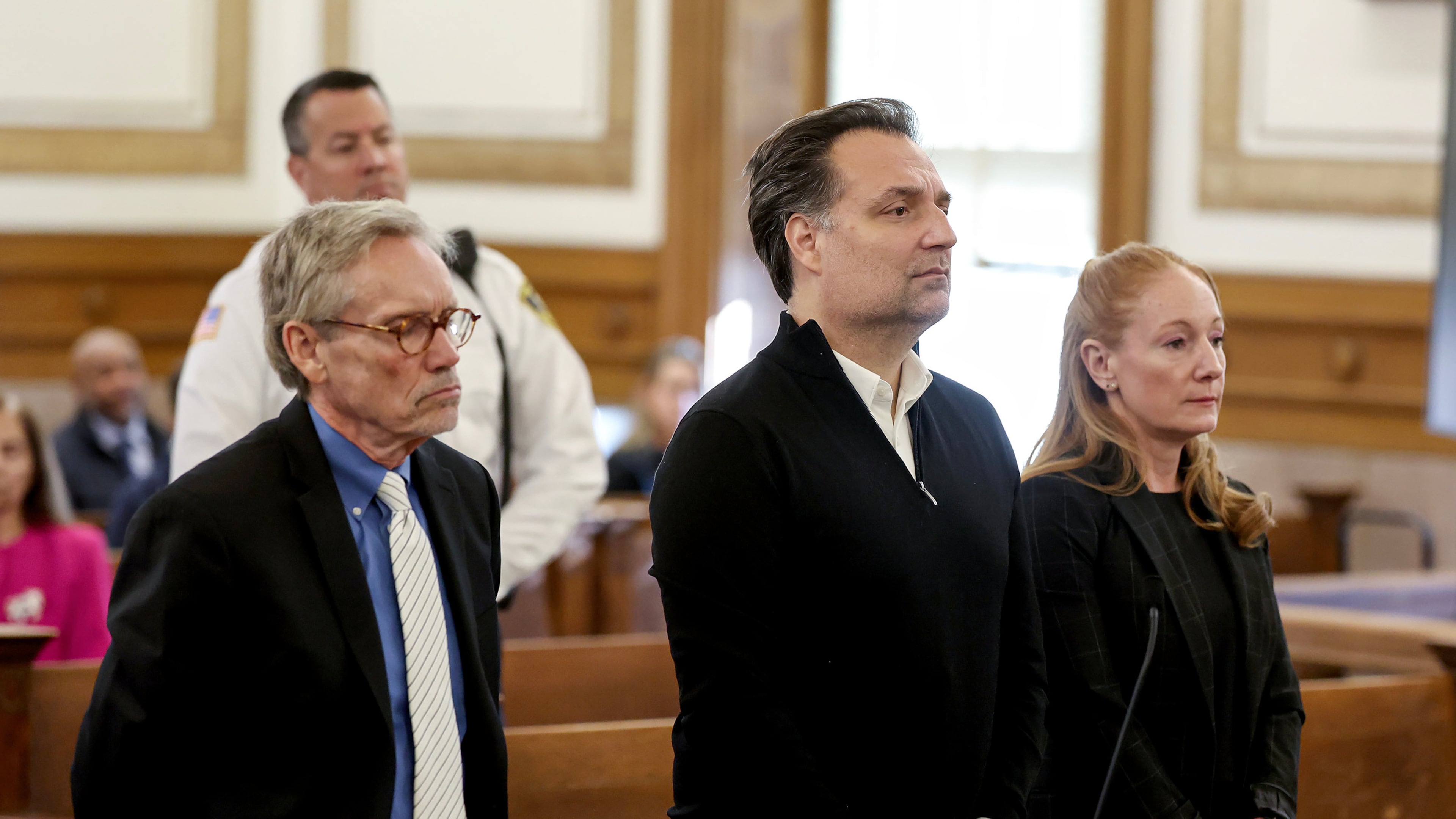 Brian Walshe, center, is sentenced in Norfolk Superior Court in Dedham, Mass., on Thursday, Dec. 18, 2025. (Mark Stockwell/Boston Herald via AP, Pool)
