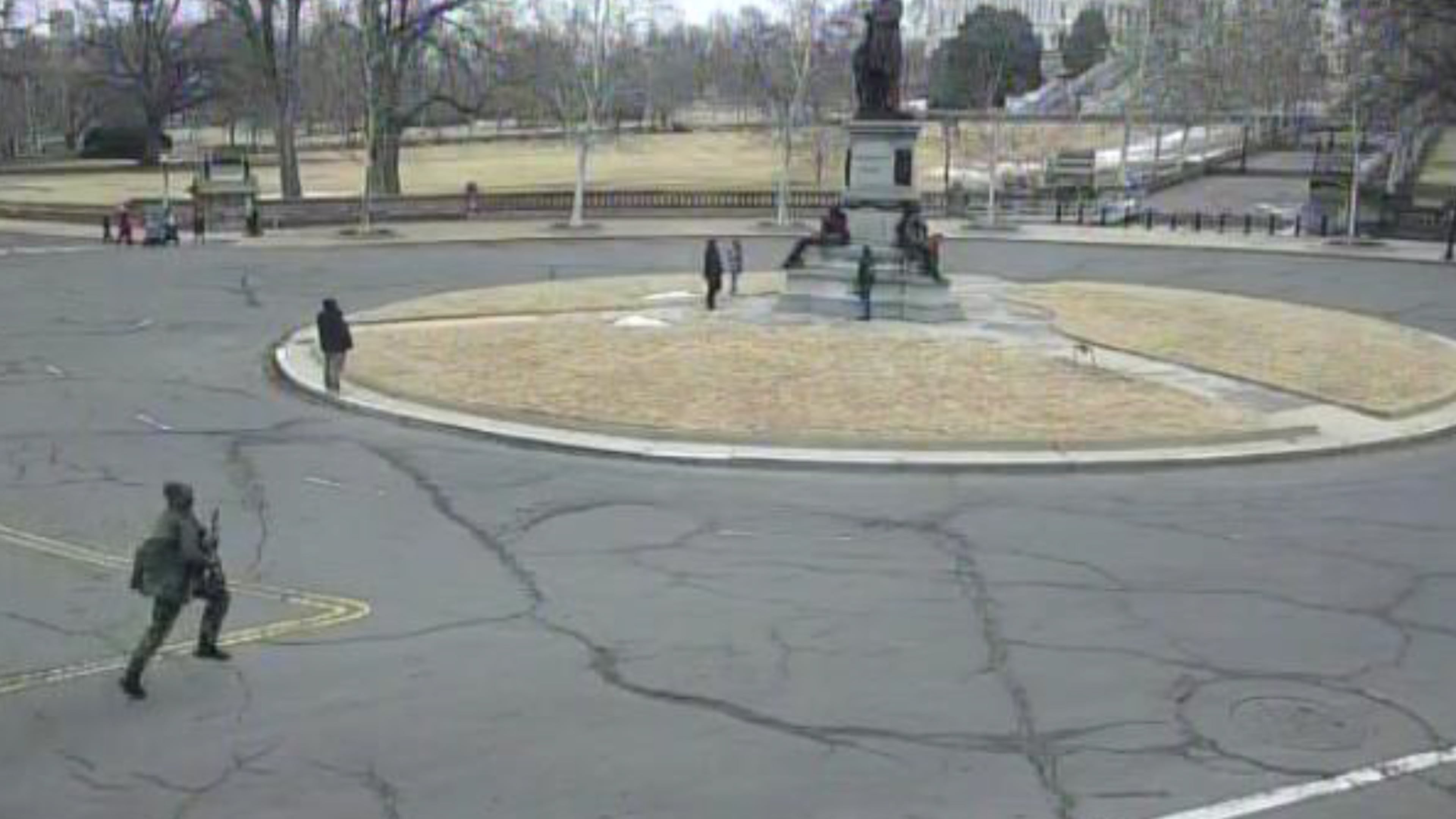 This image from video contained in the Justice Department's memorandum in support of pretrial detention of Carter Camacho, 18, shows Camacho running near the U.S. Capitol in Washington, Feb. 17, 2026. (Justice Department via AP)
