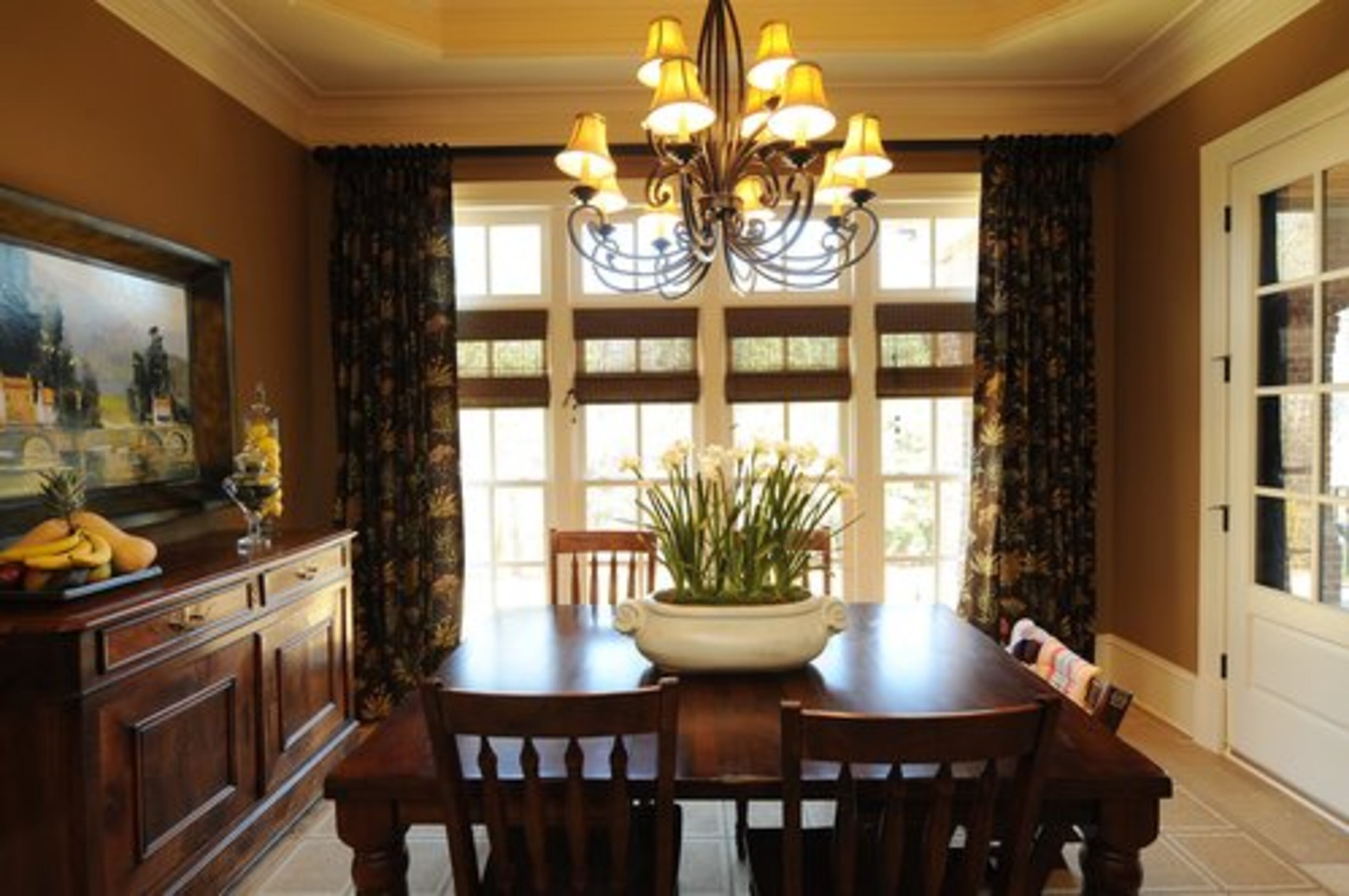 The breakfast room overlooks the wooded backyard, one of the home's selling points.
