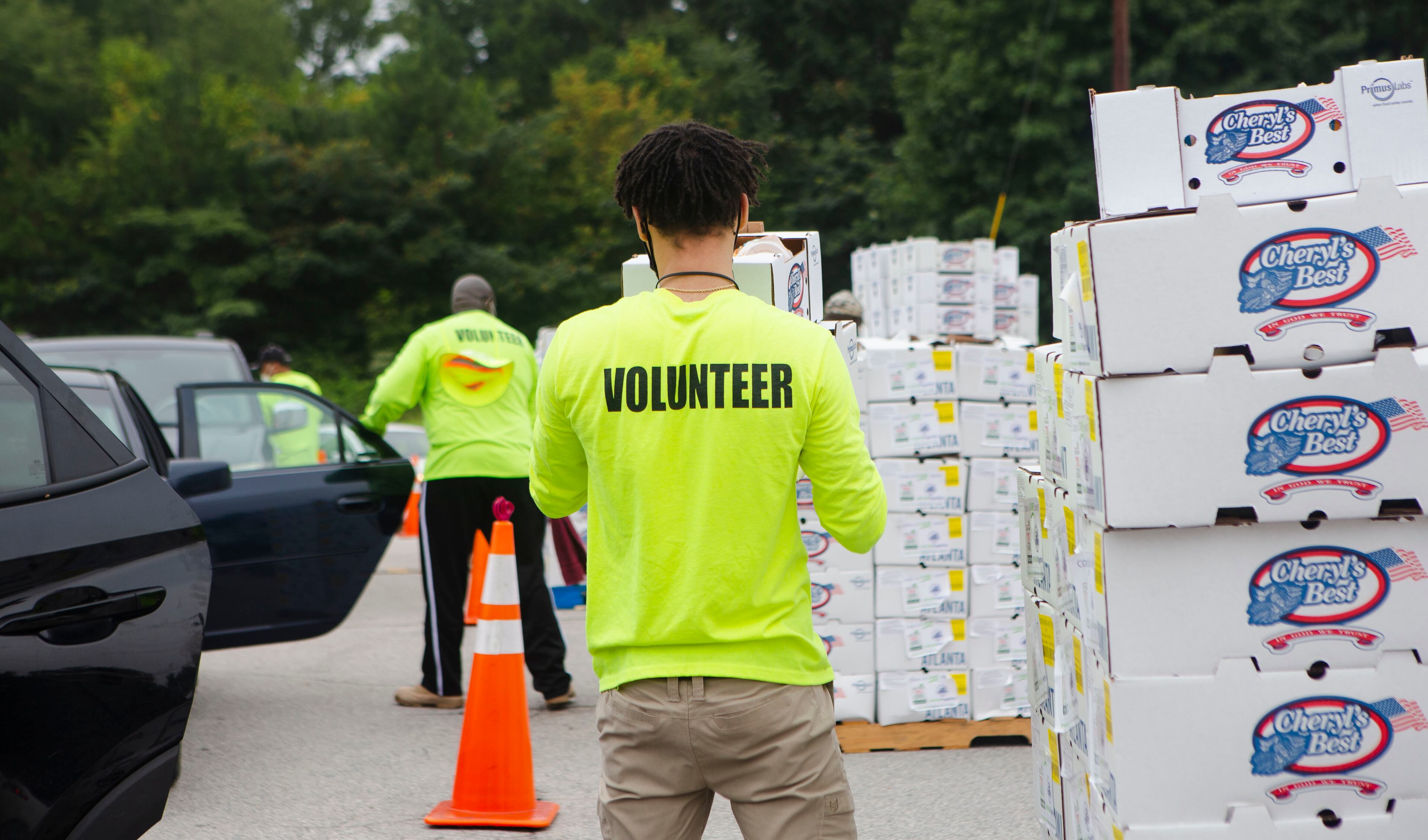 Jozef Kaspyrzyk volunteers for a food giveaway event at Berean Christian Church on Saturday, August 27, 2022, in Stone Mountain, Georgia. The free food was paid for using federal COVID-19 stimulus funds and was distributed at churches throughout DeKalb County. CHRISTINA MATACOTTA FOR THE ATLANTA JOURNAL-CONSTITUTION.