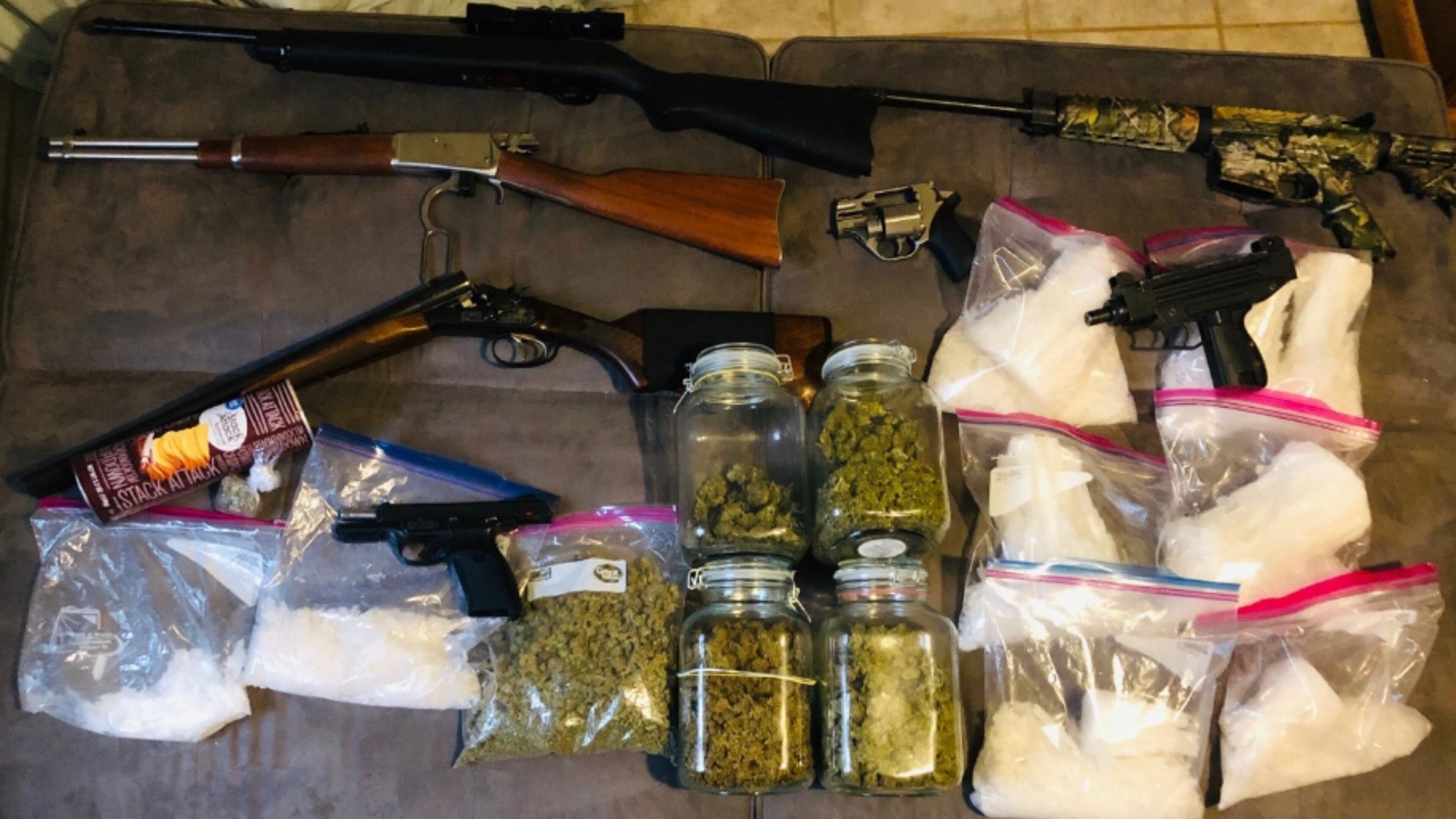 A sampling of items seized Tuesday during two Gwinnett County gang stash houses. (credit: Georgia Bureau of Investigation)