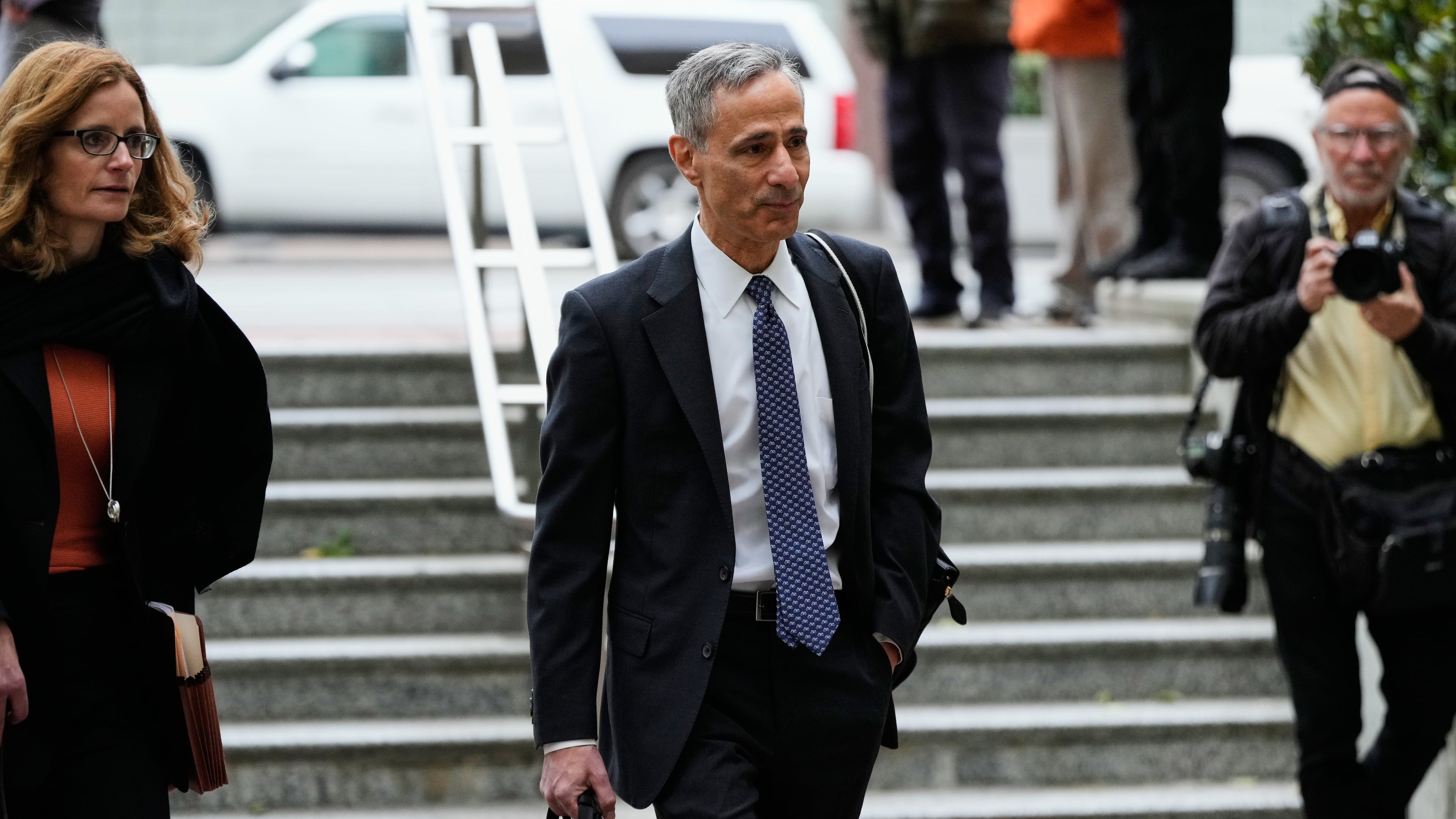 William Savitt, attorney representing OpenAI, right, arrives at the U.S. District Court in Oakland, Calif., Thursday, April 30, 2026. (AP Photo/Godofredo A. Vásquez)
