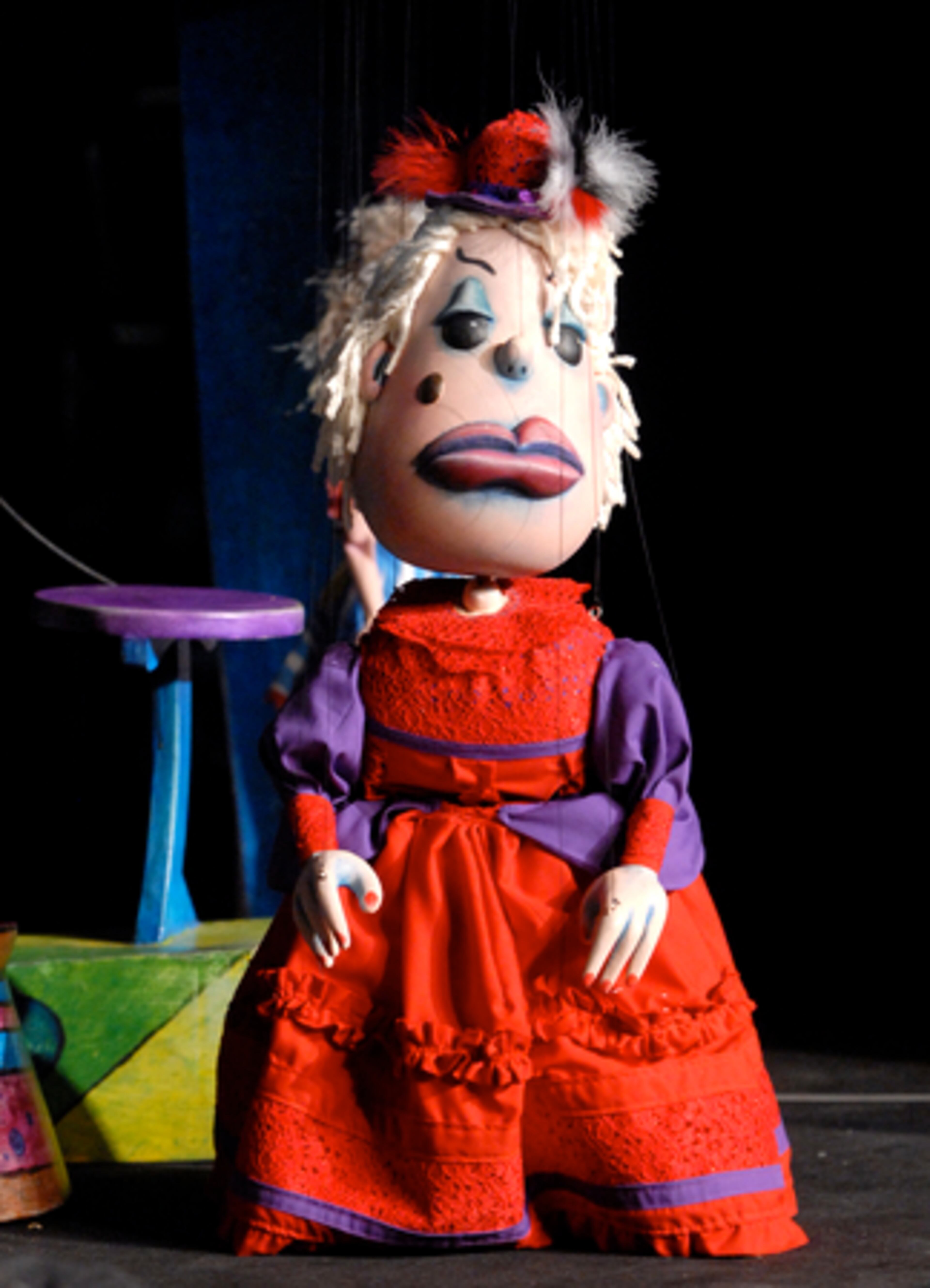 "MADAME BULLIE" is the scheming partner of legendary circus showman P.T. Barnum (who moonlights as a "fairy godmother" in the show). She acts like an evil stepmother to poor Cinderella.