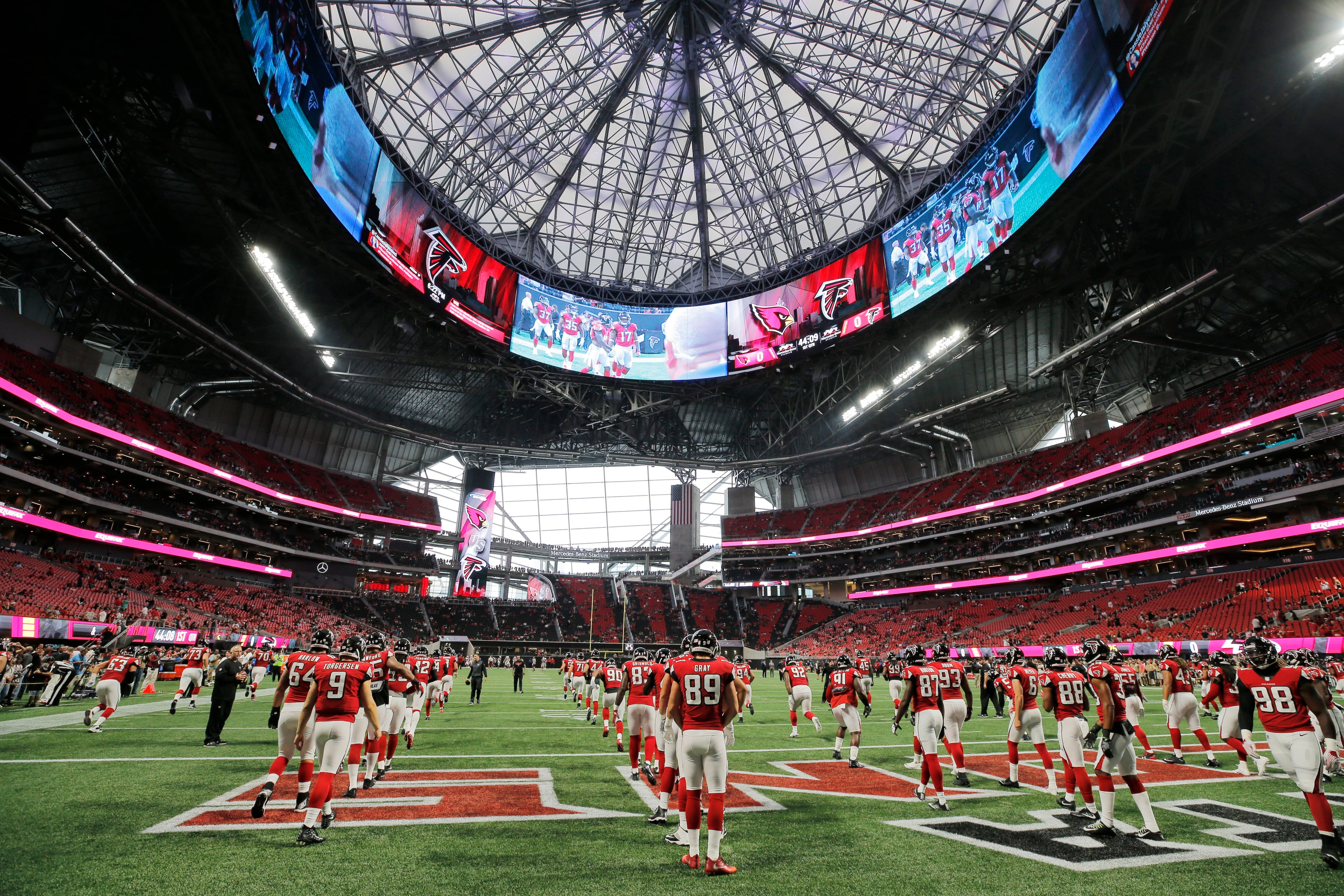 8/26/17 - Atlanta, GA - Falcons players take the field for the first time in uniform for pregame warmups. The first game in Mercedes-Benz Stadium was Saturday, as the Atlanta Falcons played Arizona in an exhibition game.. BOB ANDRES /BANDRES@AJC.COM