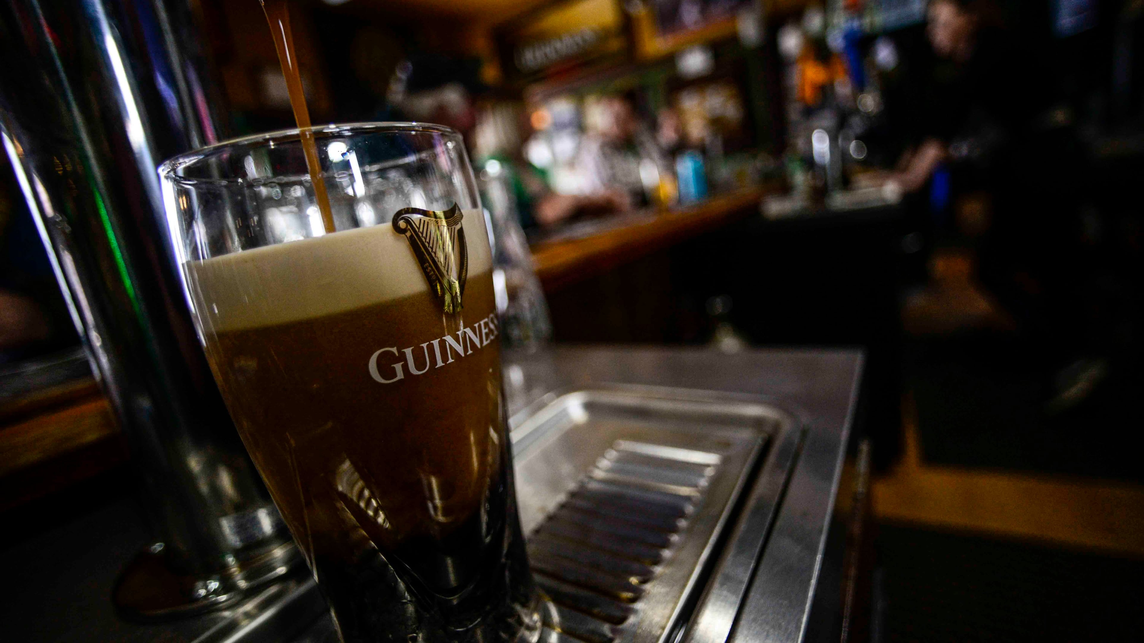 FILE - A pint of Guinness beer is poured on St. Patrick's Day on March 17, 2023, in Bellows Falls, Vt. (Kristopher Radder/The Brattleboro Reformer via AP, File)