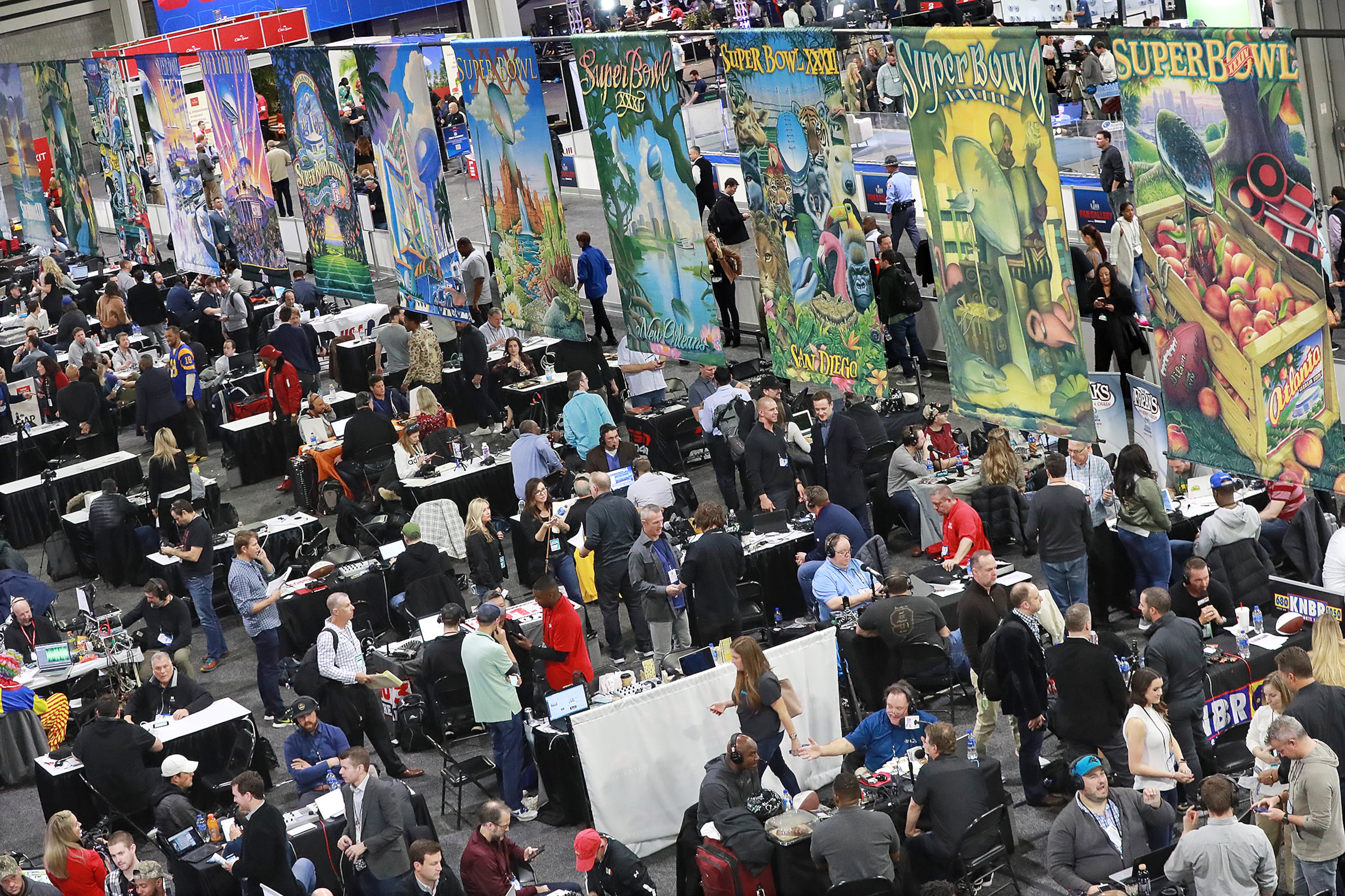 Jan. 31, 2019 Atlanta: Radio row, filled with tables of live broadcasters, is a buzz of activity in the Georgia World Congress Center on Thursday, Jan. 31, 2019, in Atlanta.