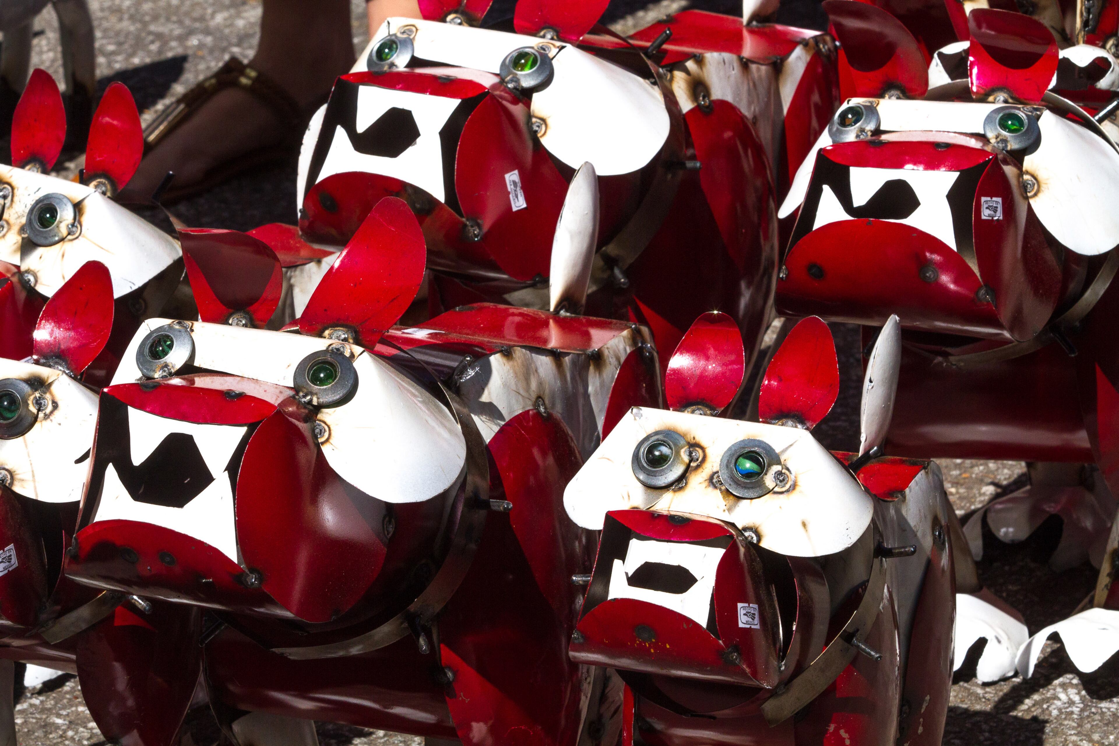 Red Bulldogs are lined up for sale at the Blue Frog Imports booth during the 47th Inman Park Spring Festival on Sunday, April 29, 2018.