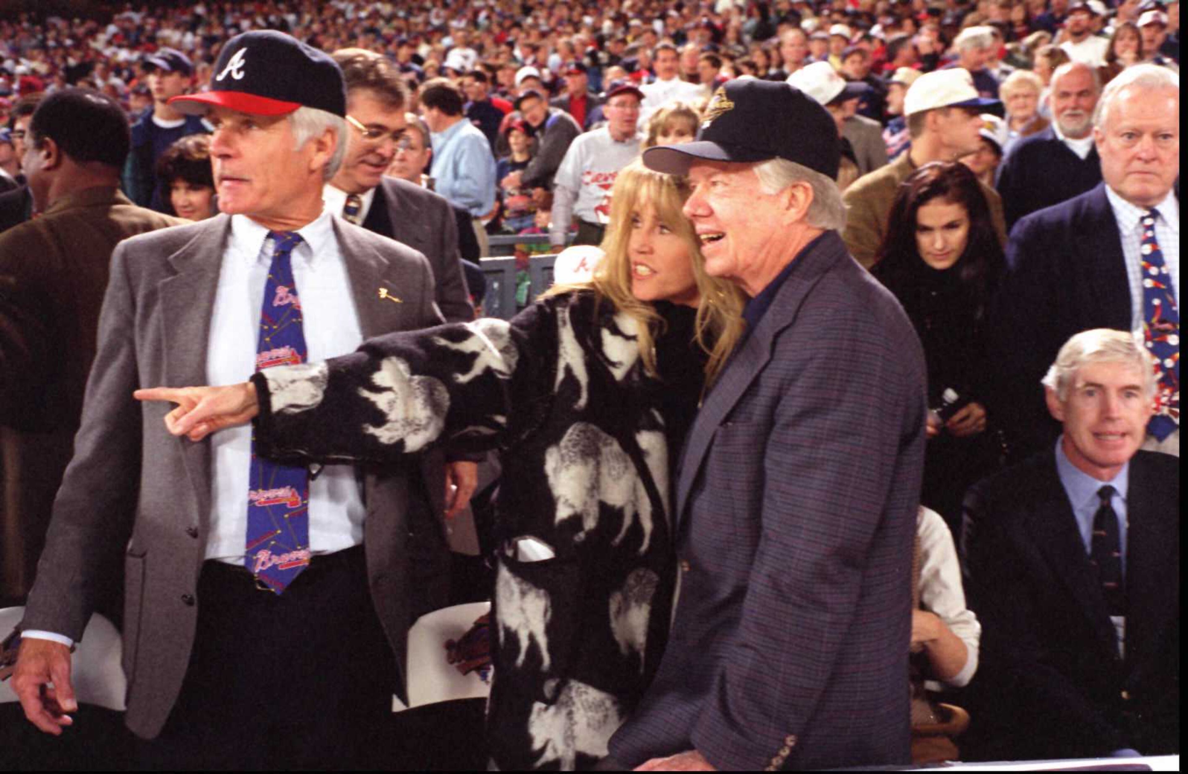 OCTOBER 21, 1995 ATLANTA FULTON COUNTY STADIUM: Ted Turner,left, is shown with his wife, Jane Fonda, and former President Jimmy Carter before game 1 of the World Series. Jonathan Newton/AJC STAFF