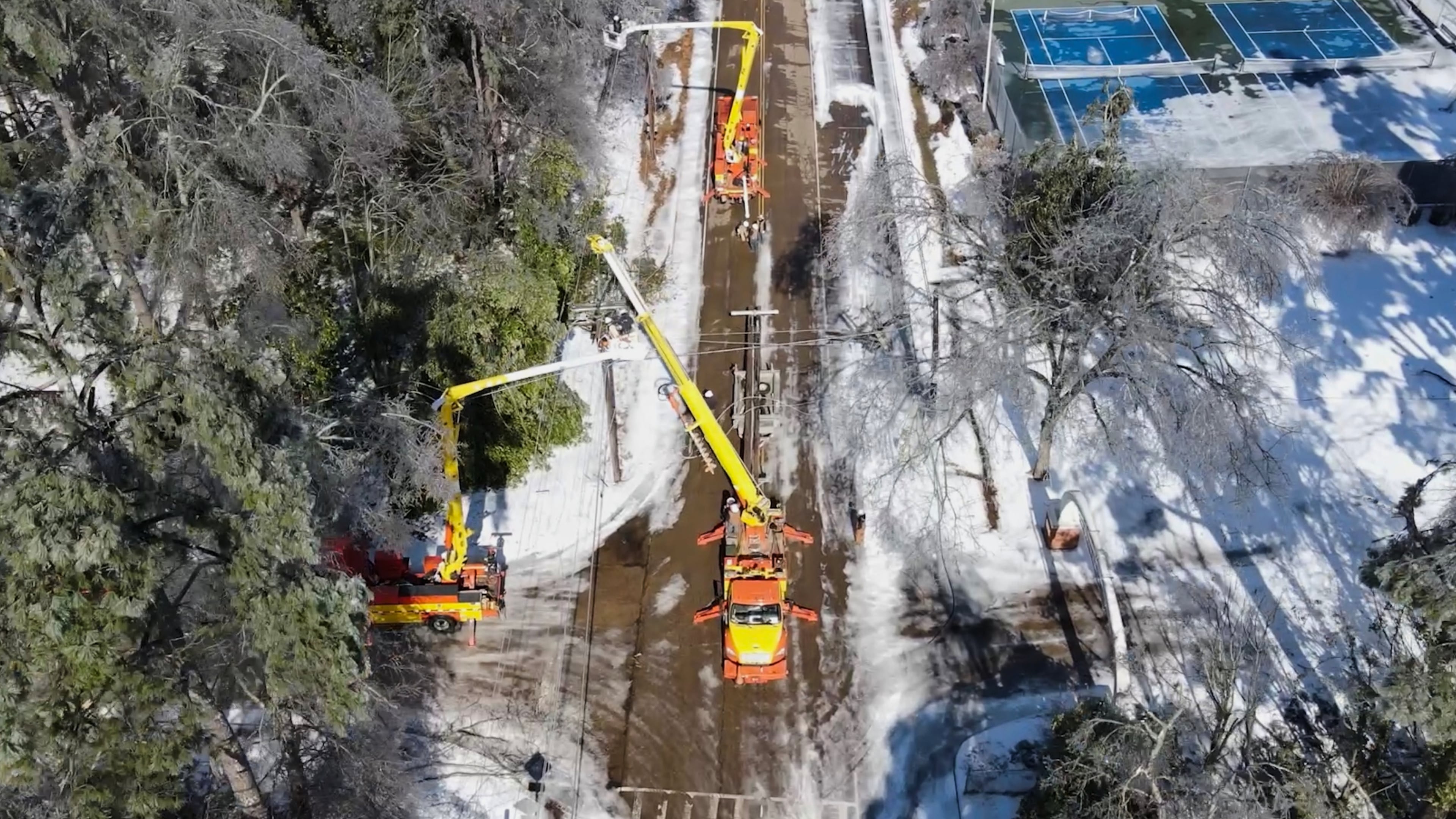 This image taken from a video released by the city of Oxford, Miss., shows crews working on power lines Tuesday, Jan. 27, 2026. (City of Oxford Mississippi via AP)