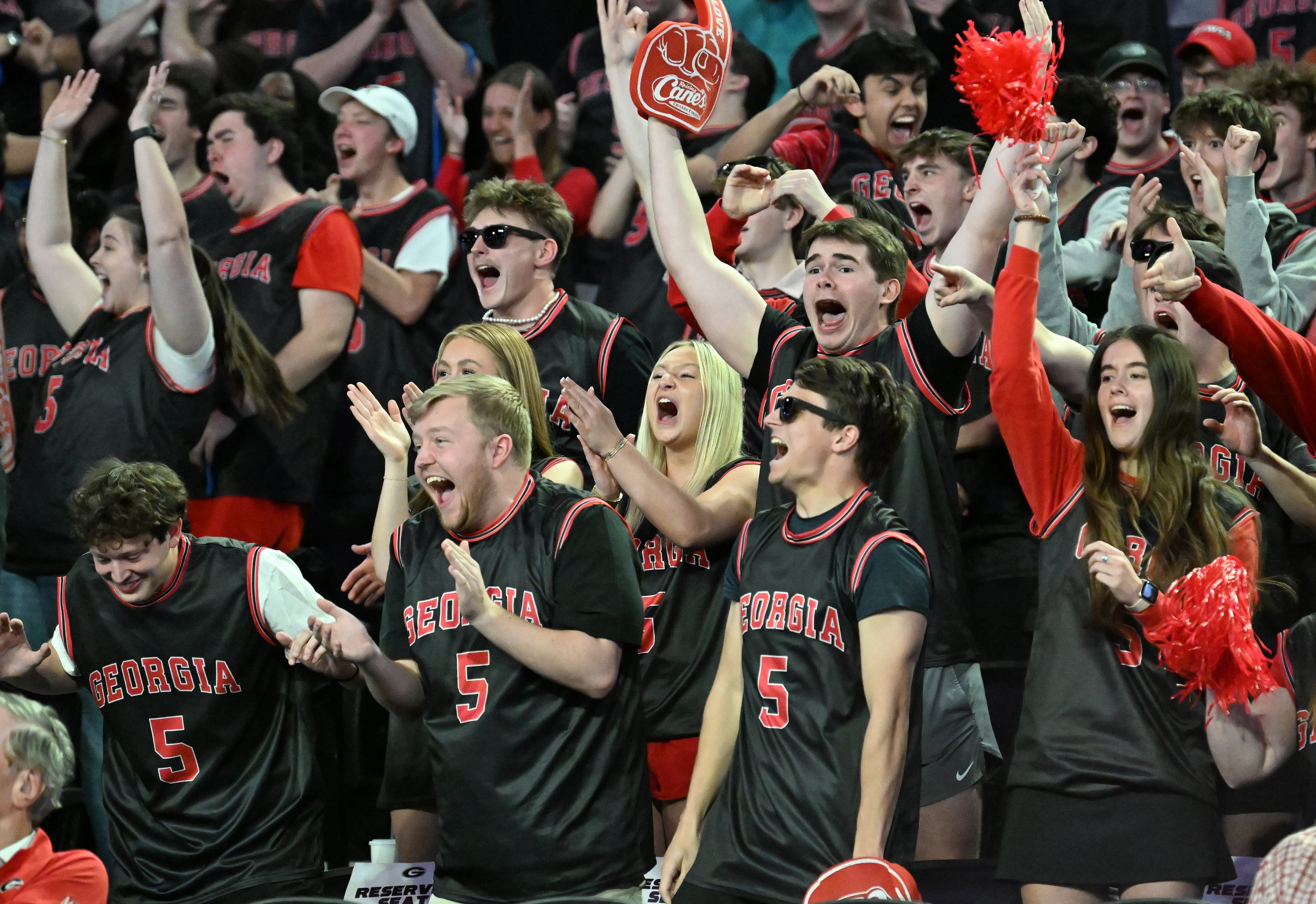 Georgia fans cheer during the first half of an NCAA college basketball game at Stegeman Coliseum, Tuesday, February 25, 2025, in Athens.(Hyosub Shin / AJC)